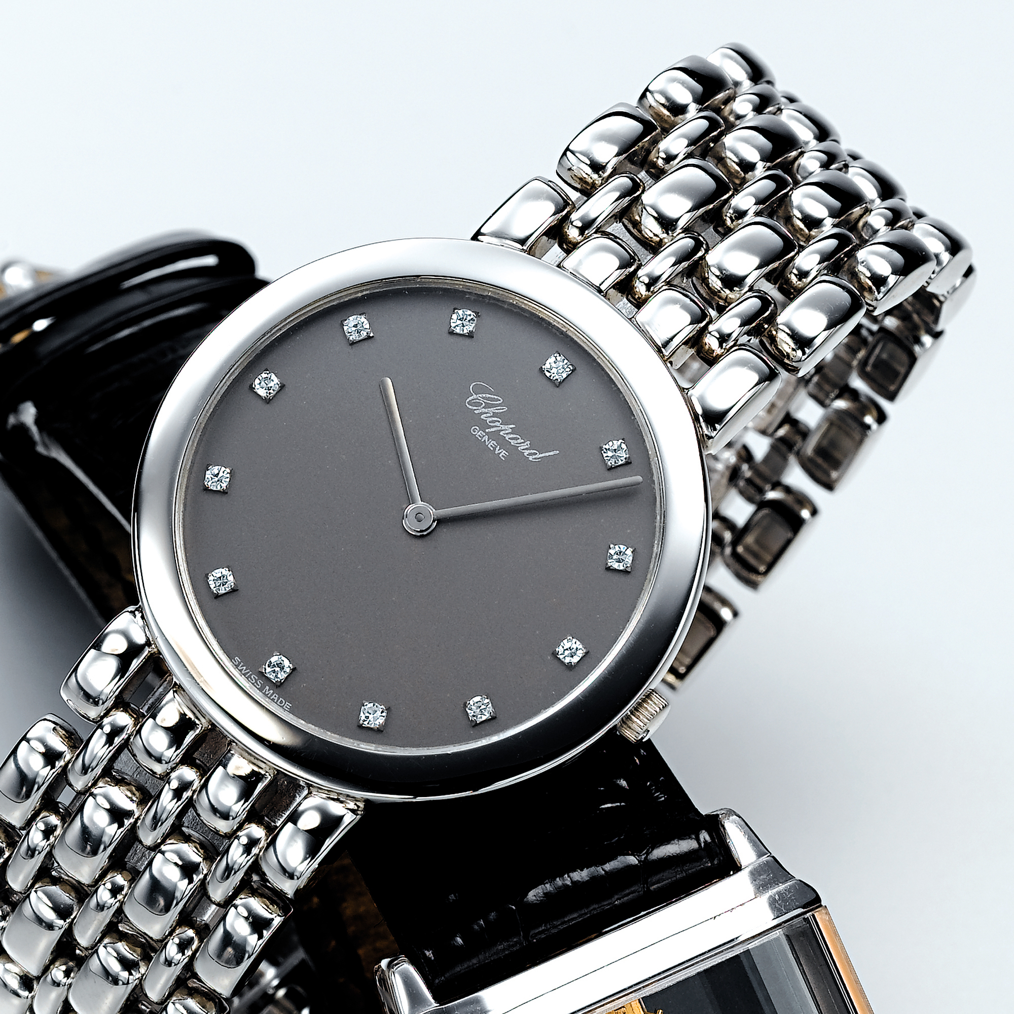 CHOPARD, A PLATINUM AND DIAMOND BRACELET WATCHCIRCA 2000