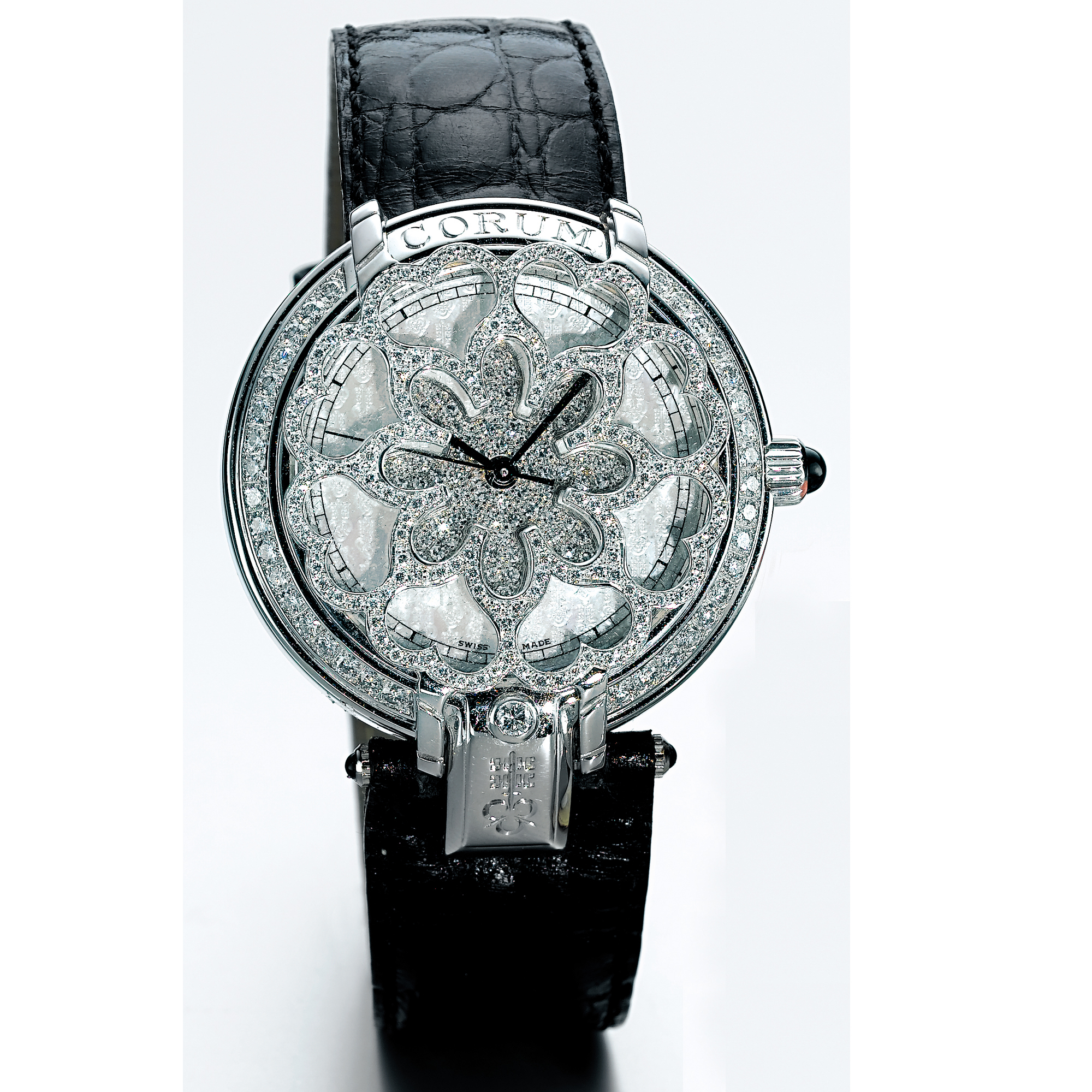 CORUM, A LADY'S WHITE GOLD AND DIAMOND SET AUTOMATICWRISTWATCH WITH ENGRAVED MOTHER-OF-PEARL DIAL CIRCA 2005
