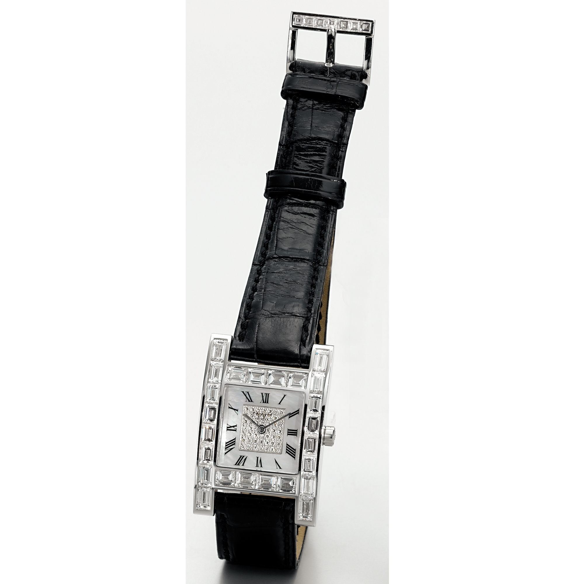 CHOPARD, A FINE WHITE GOLD AND DIAMOND SET CURVED RECTANGULAR WRISTWATCH WITH MOTHER-OF-PEARL DIALCIRCA 2003