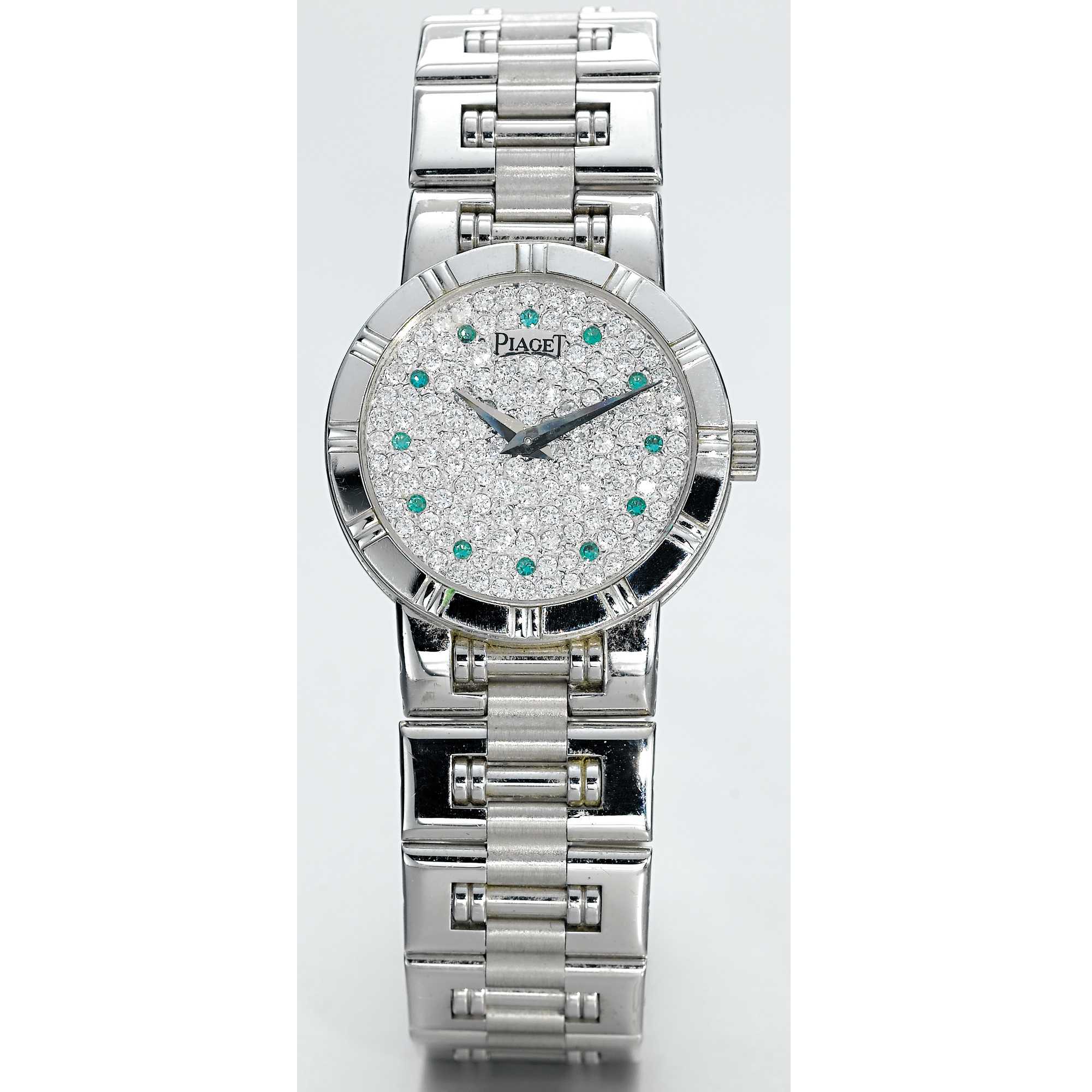 PIAGET, A LADY'S WHITE GOLD, DIAMOND AND EMERALD SET BRACELET WATCHCIRCA 2000 DANCER