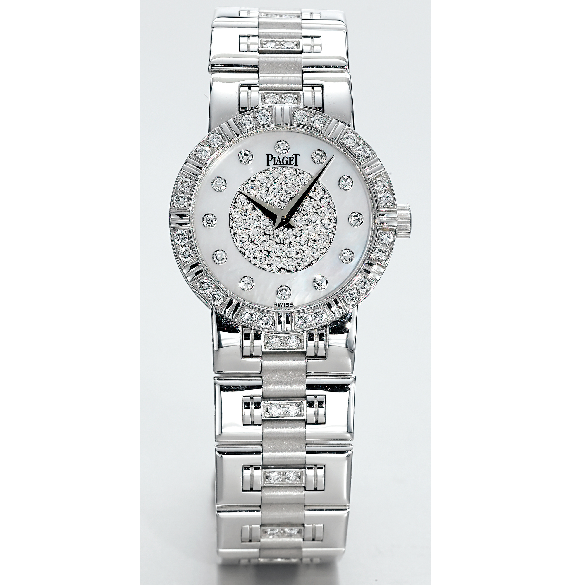 PIAGET, A LADY'S WHITE GOLD AND DIAMOND SET BRACELET WATCH WITH MOTHER OF PEARL DIALCIRCA 2000 DANCER