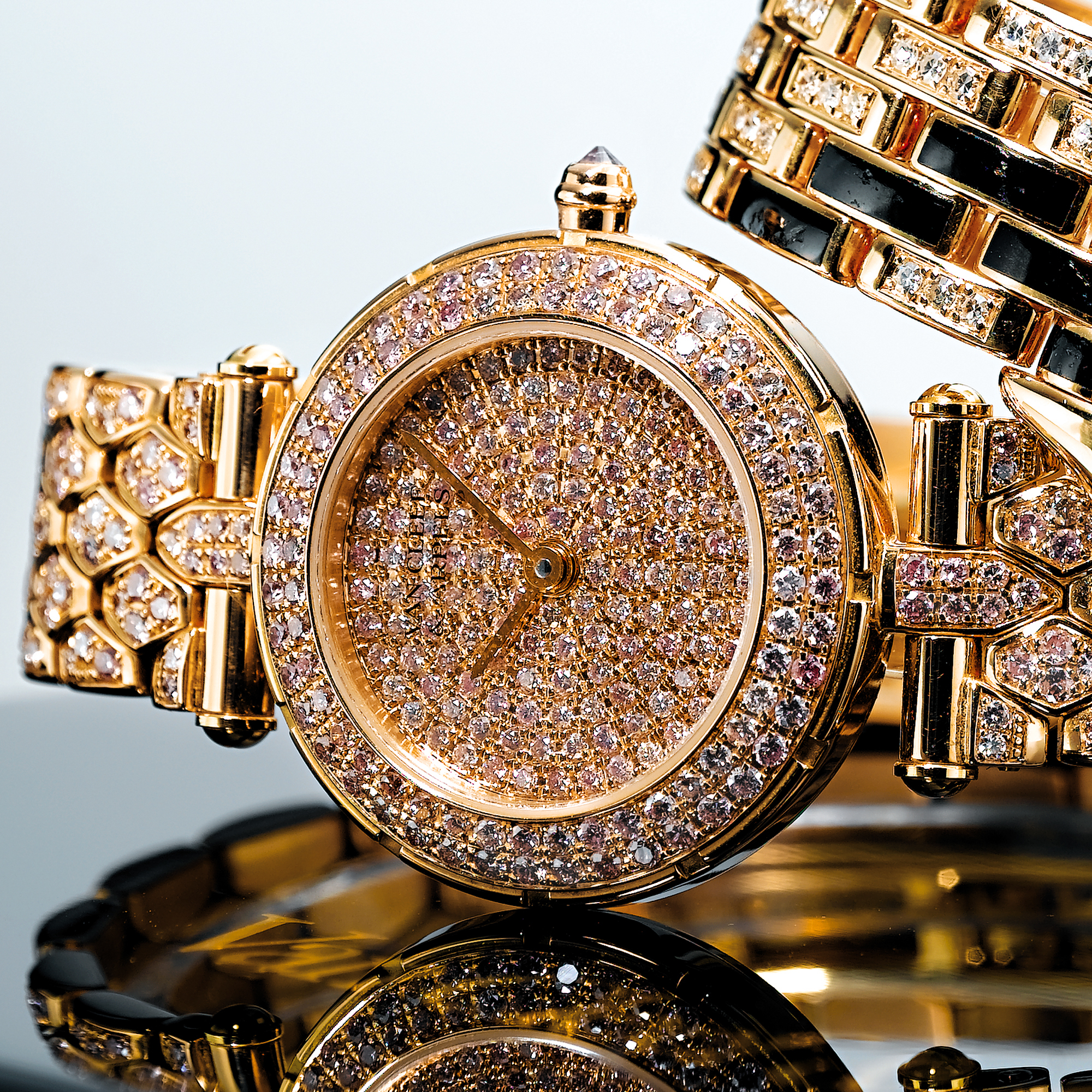 VAN CLEEF & ARPELS, A LADY'S FINE GOLD AND PINK DIAMOND SET BRACELET WATCHCIRCA 2000
