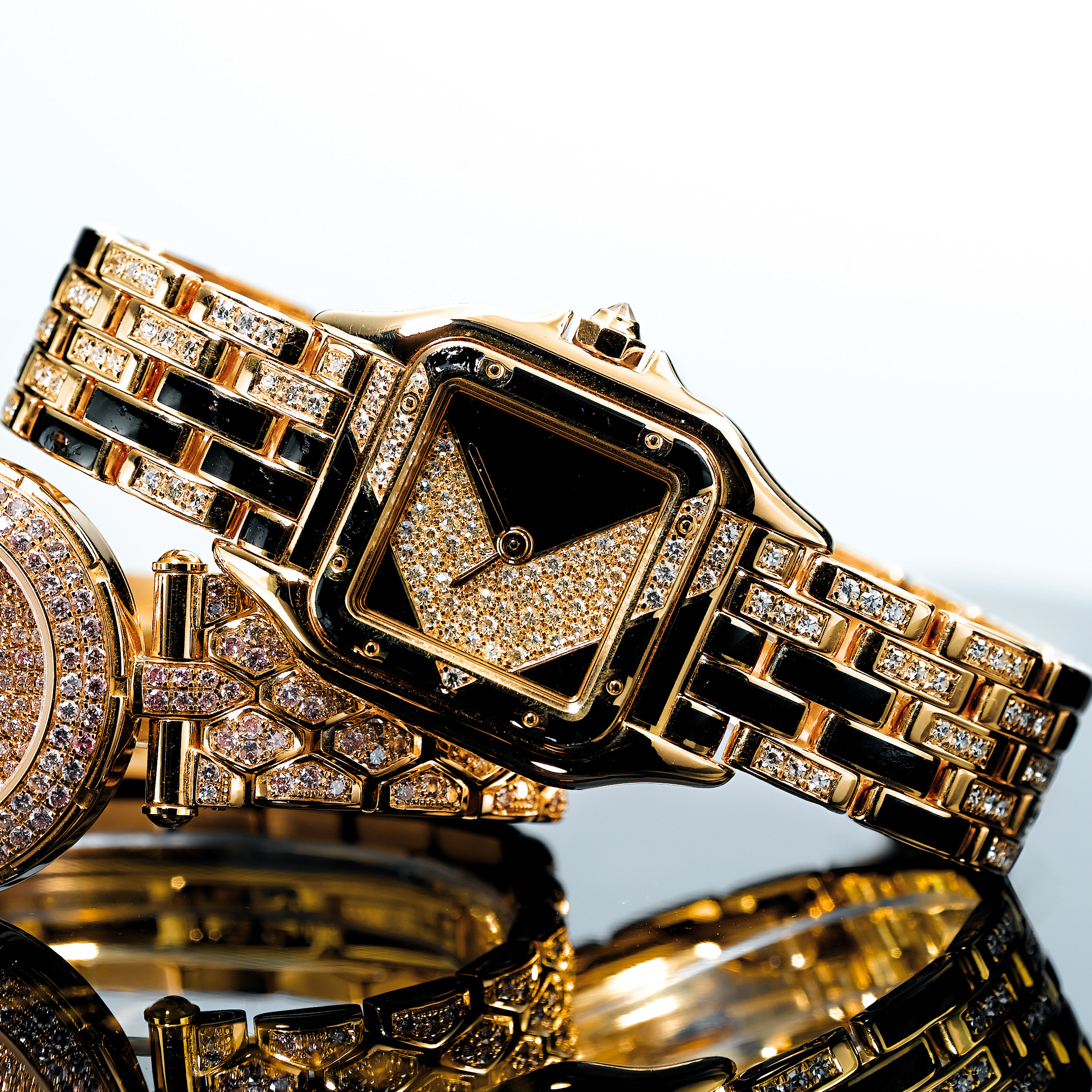 CARTIER, A LADY'S FINE LIMITED EDITION GOLD, DIAMOND AND BLACK ENAMEL BRACELET WATCHCIRCA 1994 PANTHERE 1/1994