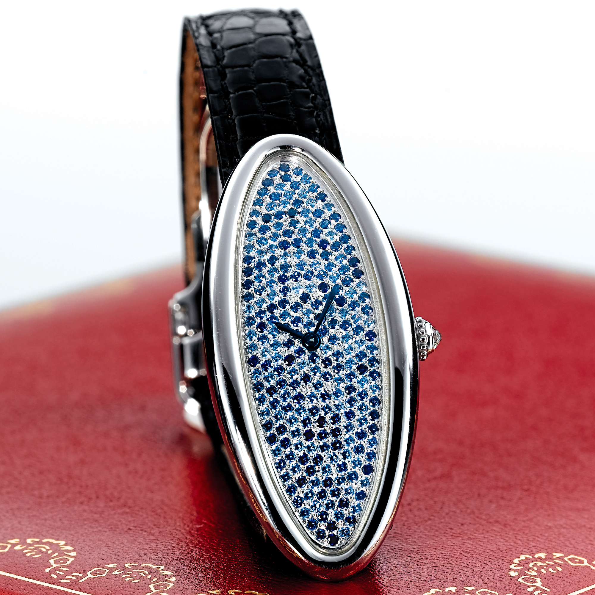CARTIER, A LADY'S WHITE GOLD AND SAPPHIRE SET ELONGATED OVAL WRISTWATCH CIRCA 2003 BAIGNOIRE ALLONGEE