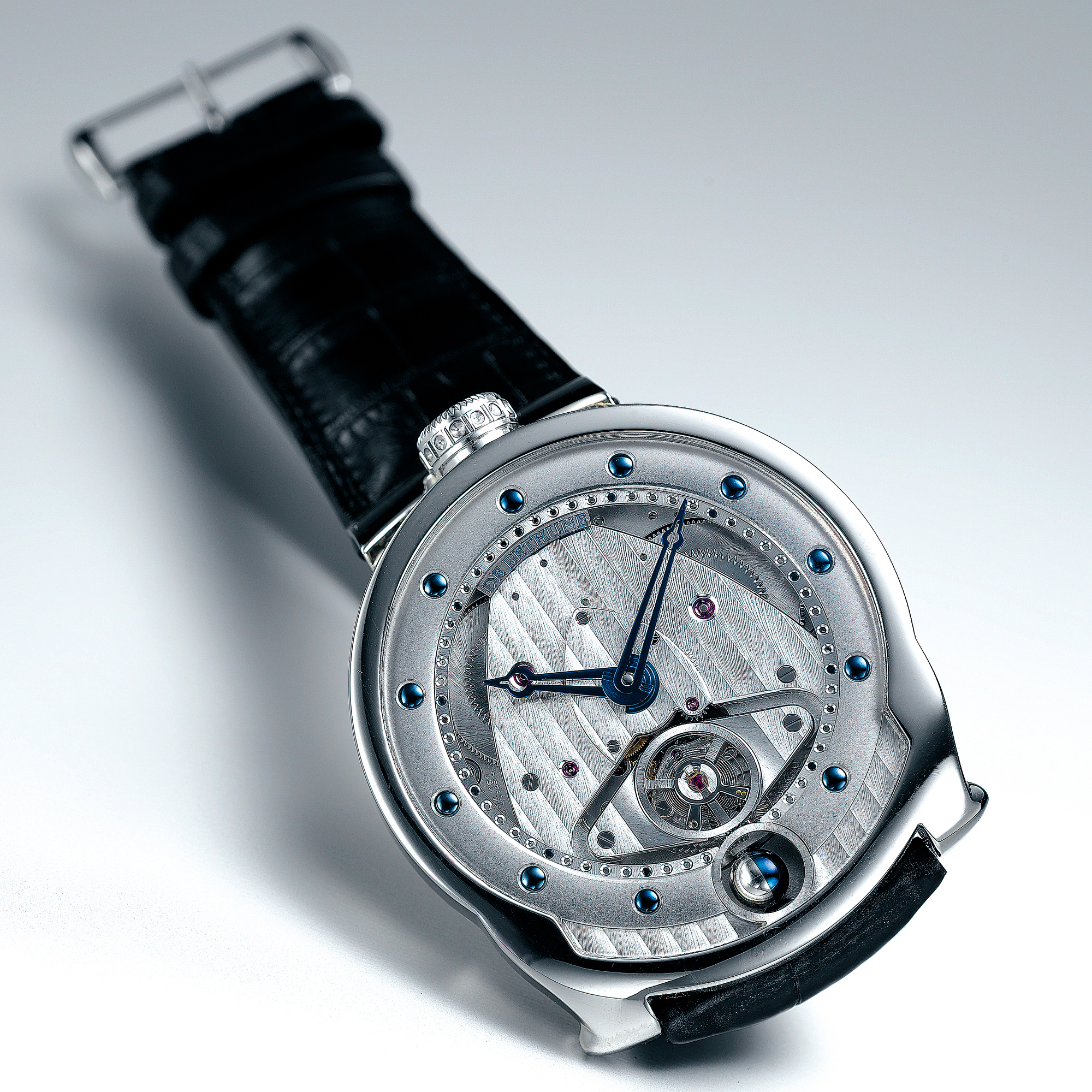 De Bethune, AN UNUSUAL PLATINUM SEMI-SKELETONISED WRISTWATCH WITH MOON-PHASES AND 8 DAY POWERCIRCA 2005 DBS-P NO 009