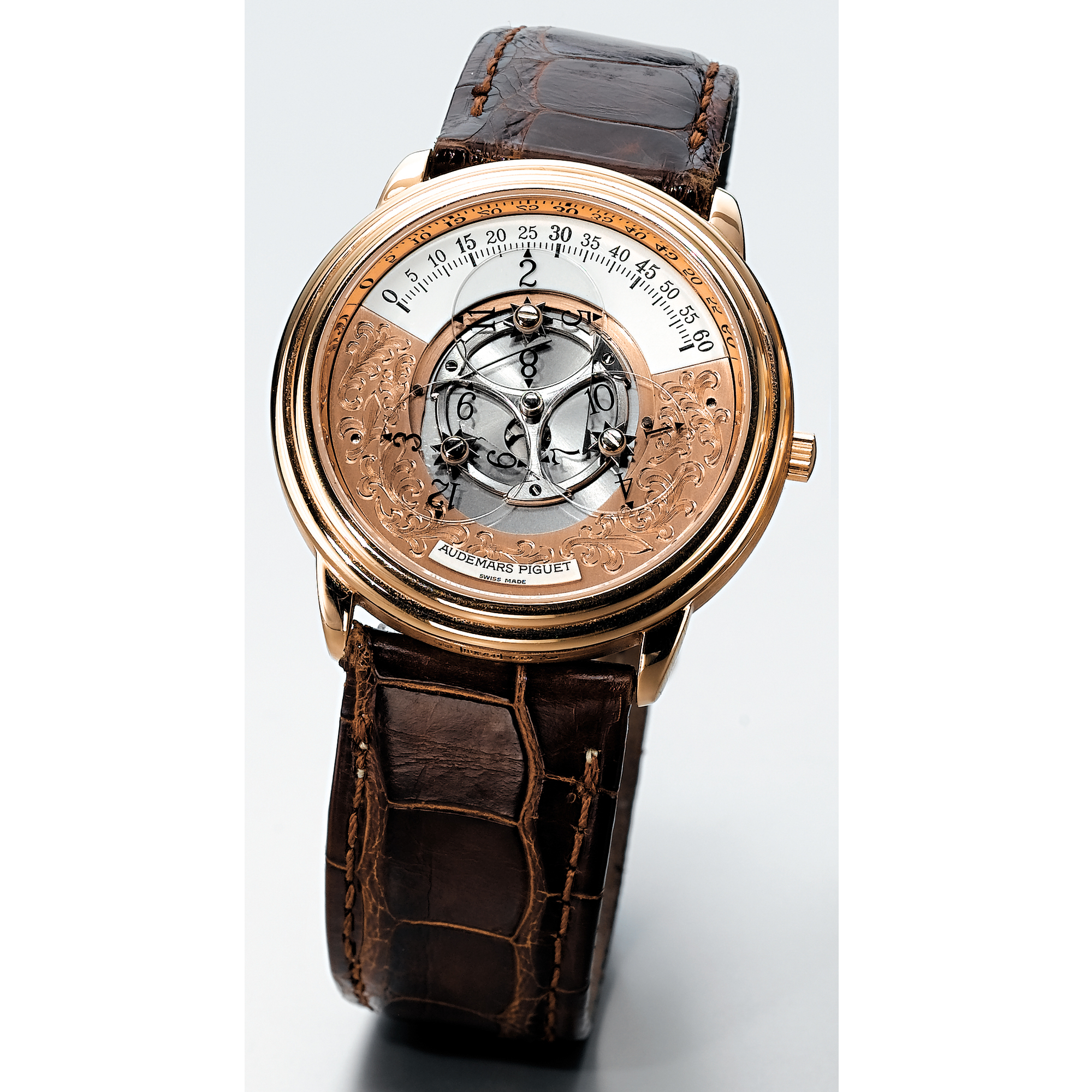 Audemars Piguet, AN UNUSUAL PINK GOLD AUTOMATIC JUMP-HOUR WRISTWATCH CIRCA 1993 STAR WHEEL NO D20992