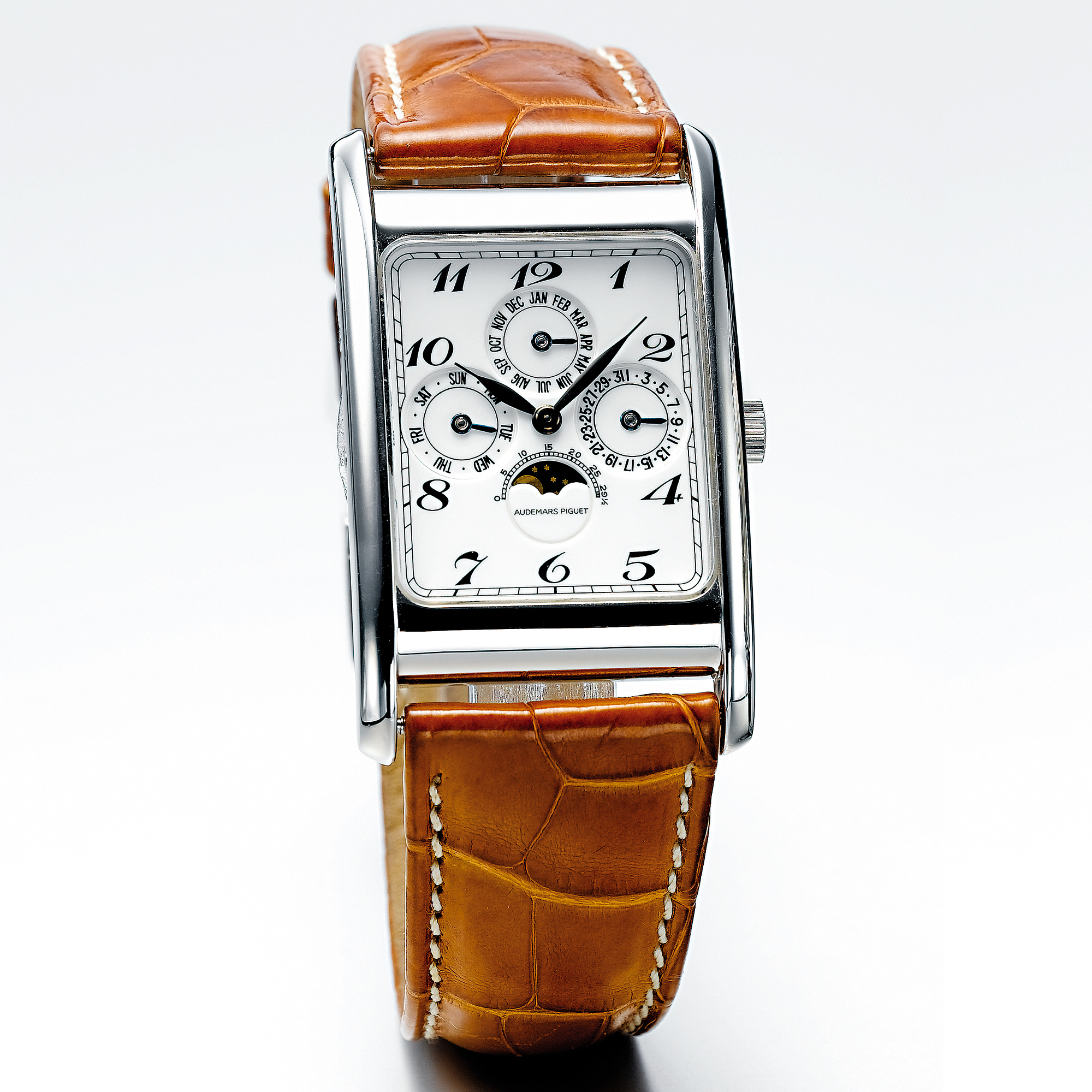 AUDEMARS PIGUET, A PLATINUM RECTANGULAR PERPETUAL CALENDAR WRISTWATCH WITH MOON-PHASESCIRCA 2000 EDWARD PIGUET