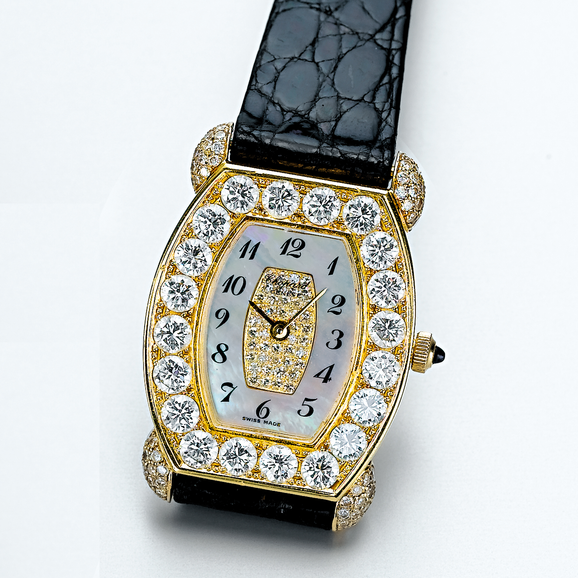CHOPARD, A LADY'S GOLD AND DIAMOND SET TONNEAU WRISTWATCH WITH MOTHER-OF-PEARL DIALCIRCA 1990