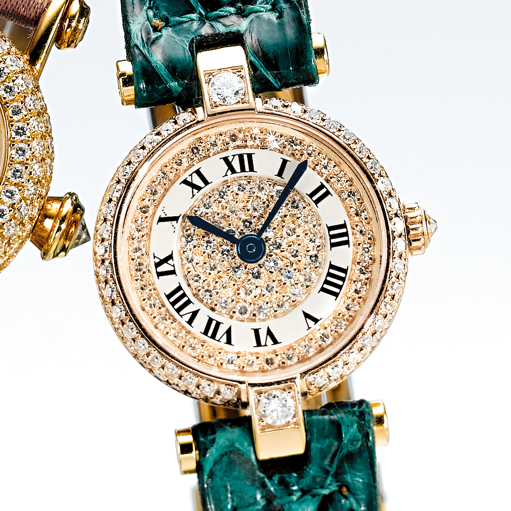 CARTIER, A LADY'S GOLD AND DIAMOND SET WRISTWATCHCIRCA 1995 RIVOLI