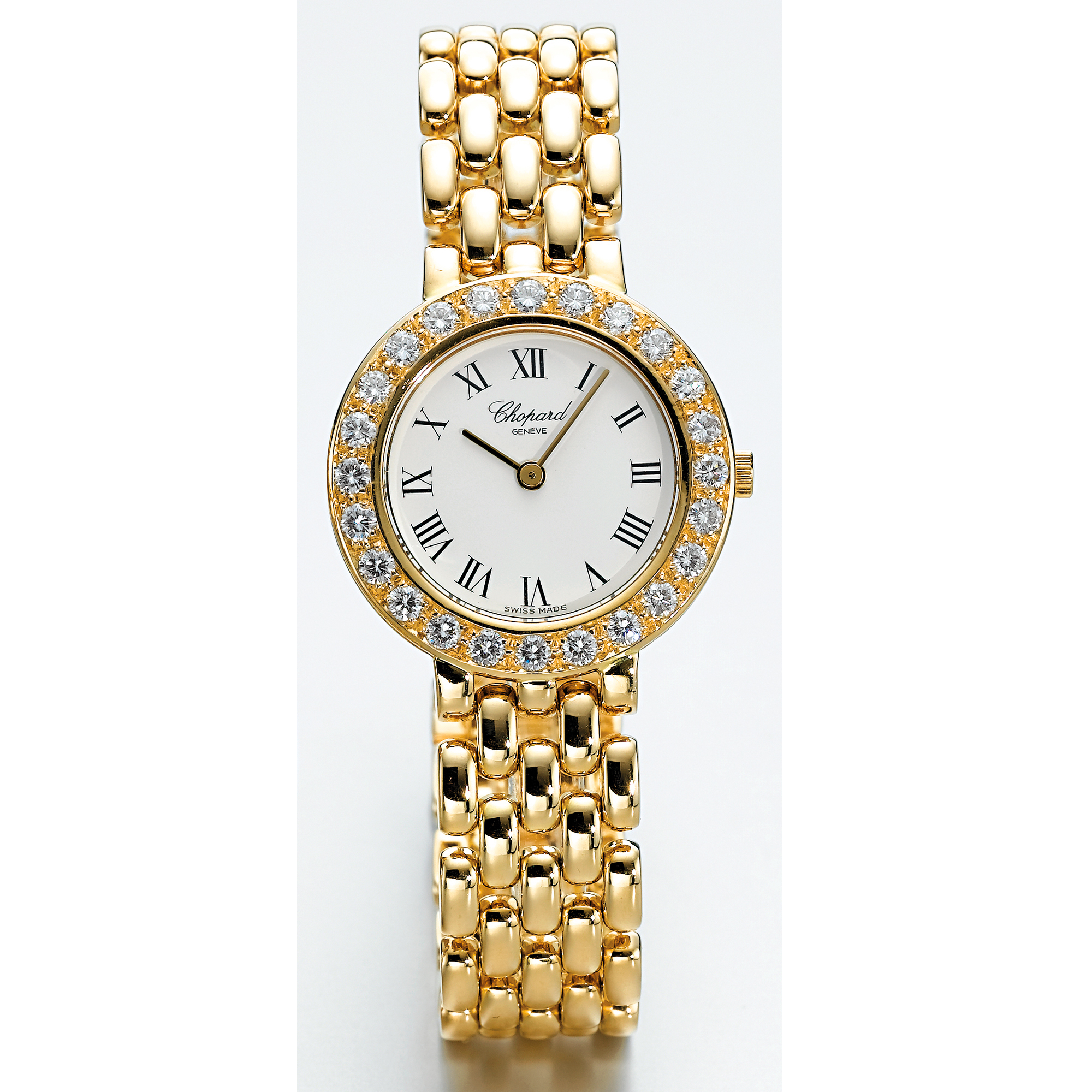 CHOPARD, A LADY'S GOLD AND DIAMOND SET BRACELET WATCH CIRCA 1995