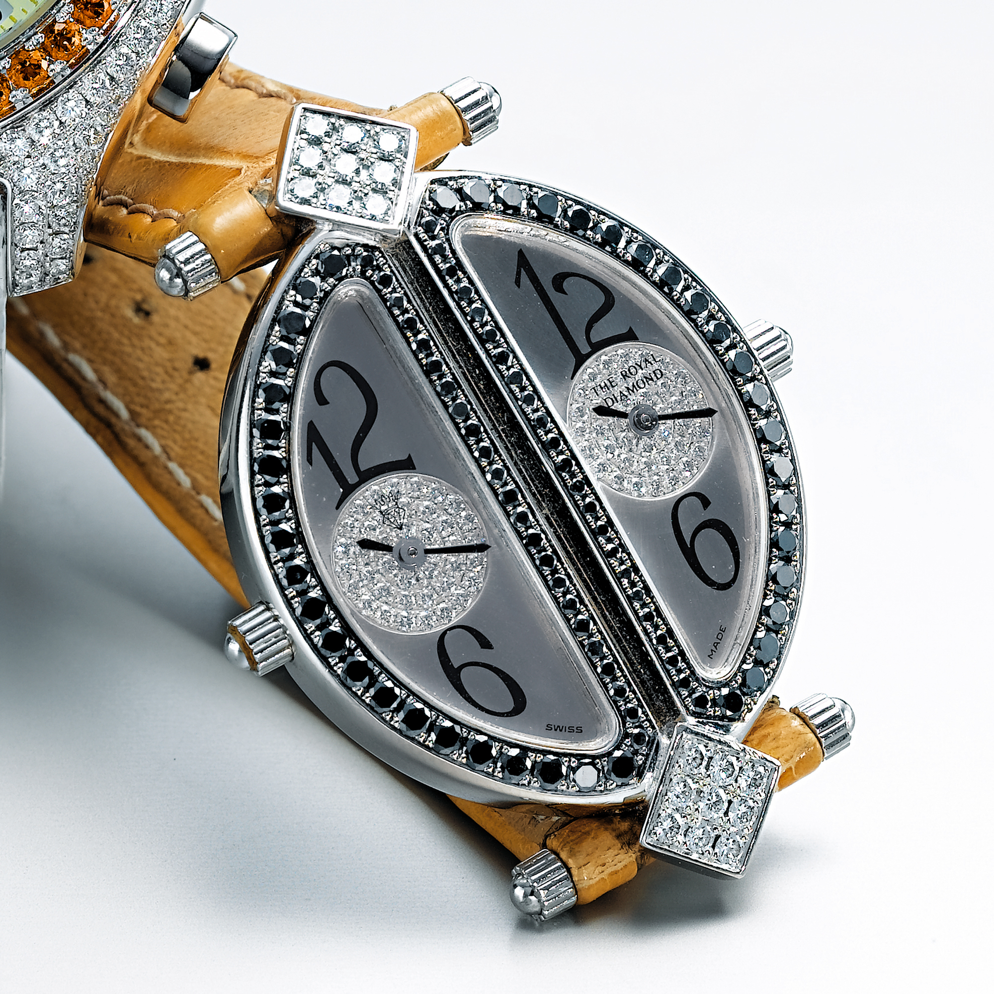 THE ROYAL DIAMOND, A LADY'S DIAMOND AND BLACK DIAMOND SET OVAL DUAL TIME WRISTWATCH WITH TWIN DIALSCIRCA 1998 DOUBLE