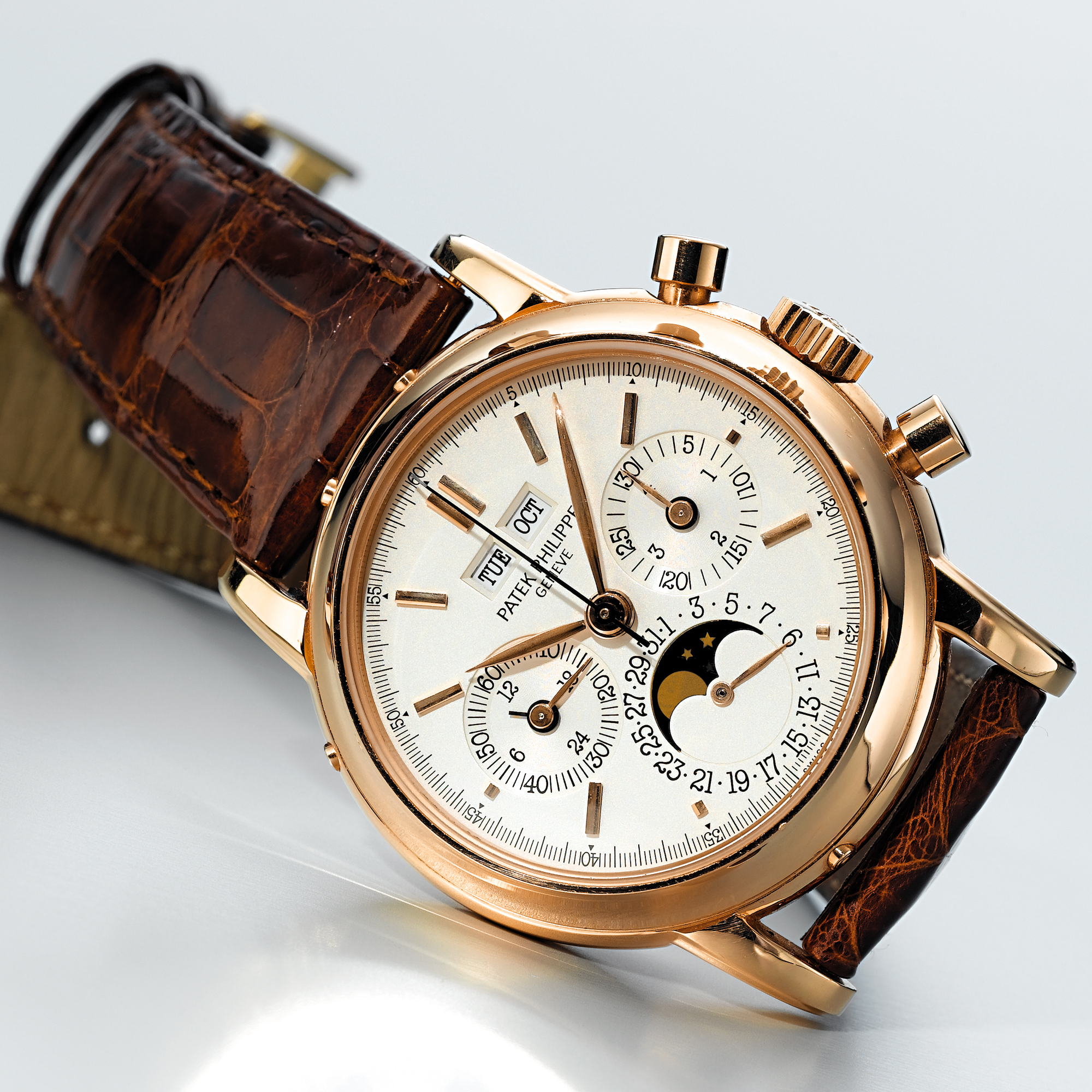 PATEK PHILIPPE, A FINE AND RARE GOLD PERPETUAL CALENDAR CHRONOGRAPH WRISTWATCH WITH MOON¿PHASES AND REGISTERCIRCA 1990 REF 3970ER MVT 876027