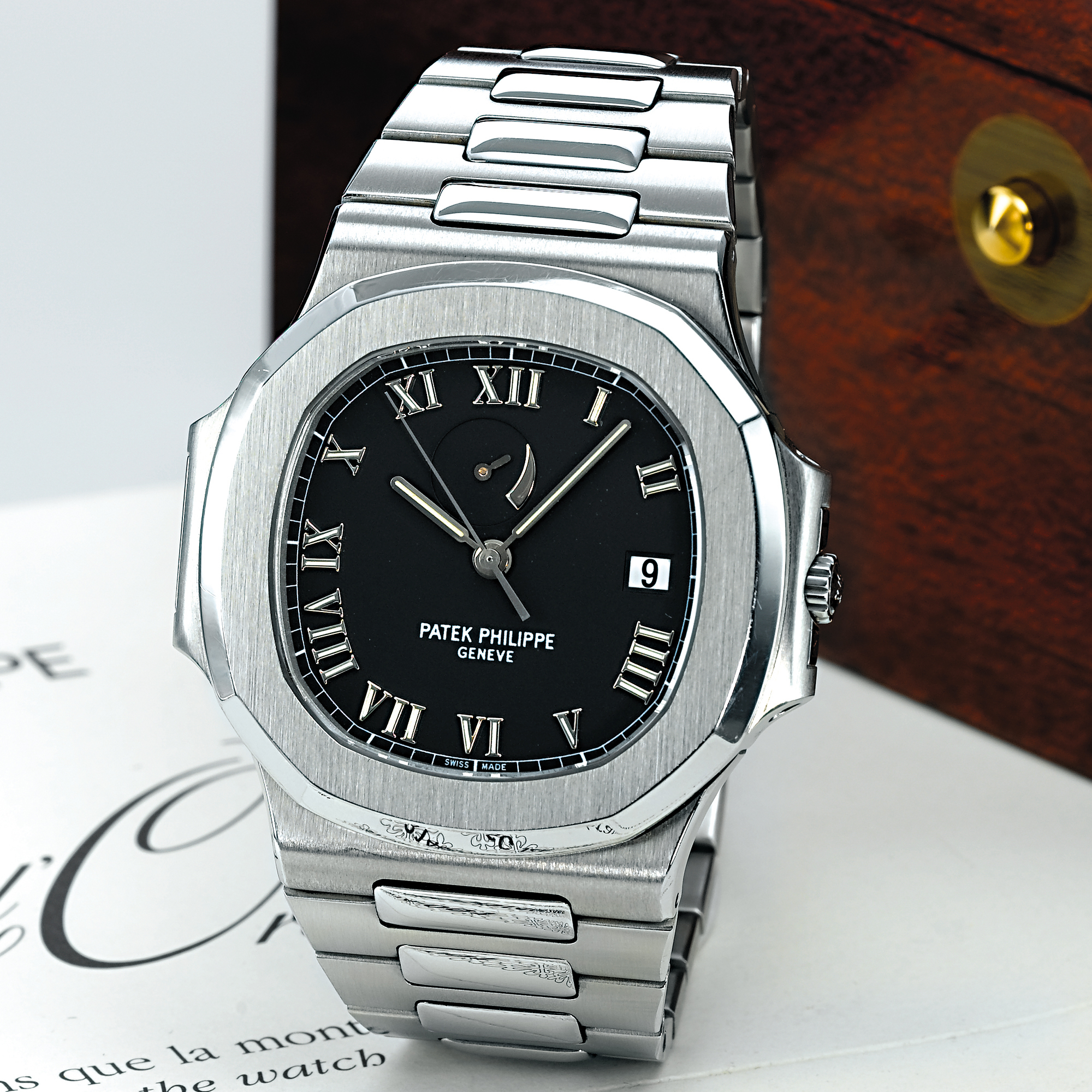 PATEK PHILIPPE, A LARGE AUTOMATIC STAINLESS STEEL CENTRE SECONDS BRACELET WATCH WITH POWER RESERVE AND DATECIRCA 2000 NAUTILUS REF 3710/1 MVT 3148650 CASE 4062465