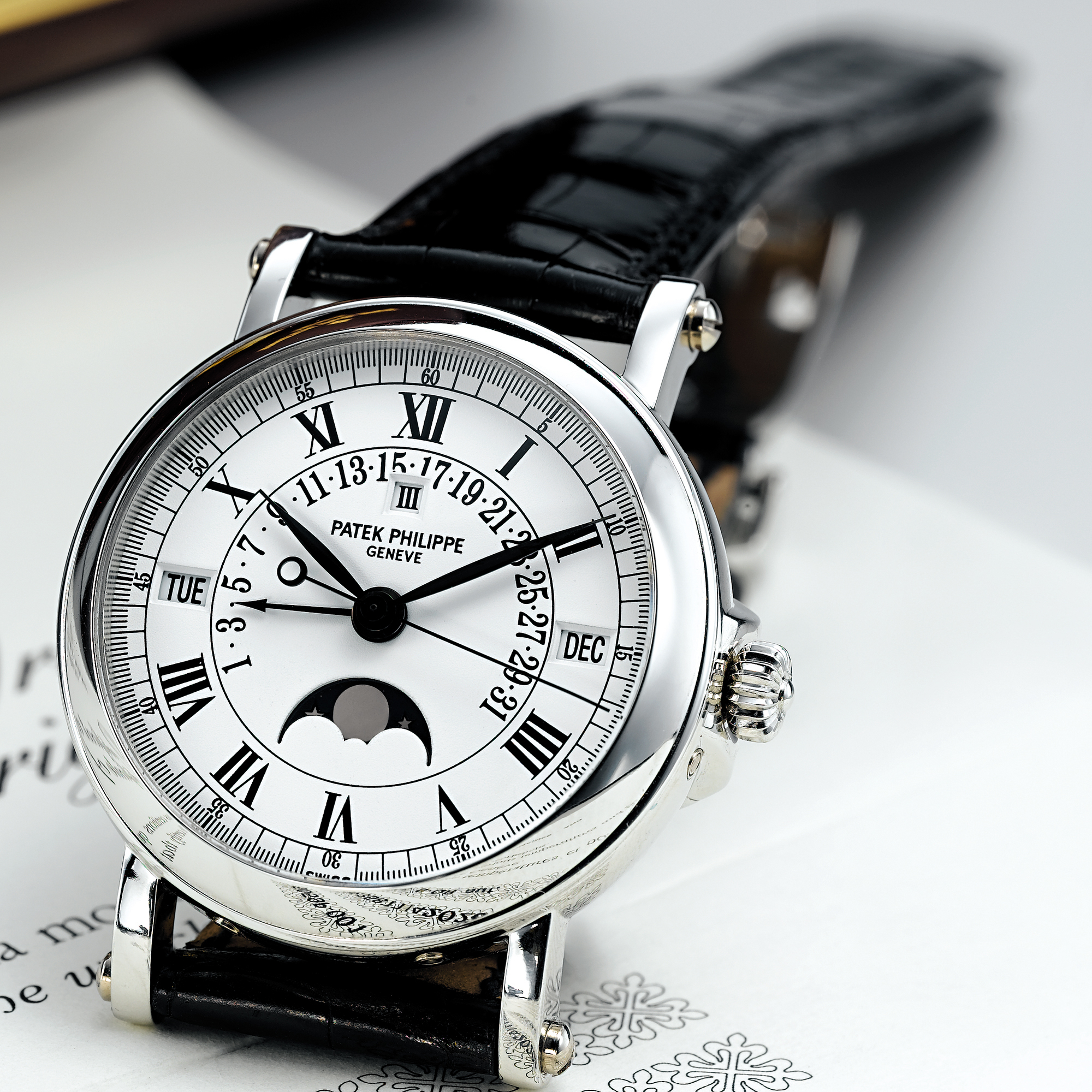 PATEK PHILIPPE, A FINE PLATINUM AUTOMATIC CENTRE SECONDS RETROGRADE PERPETUAL CALENDAR WRISTWATCH WITH MOON-PHASESCIRCA 2003 REF 5059P MVT 3235877 CASE 4202046  