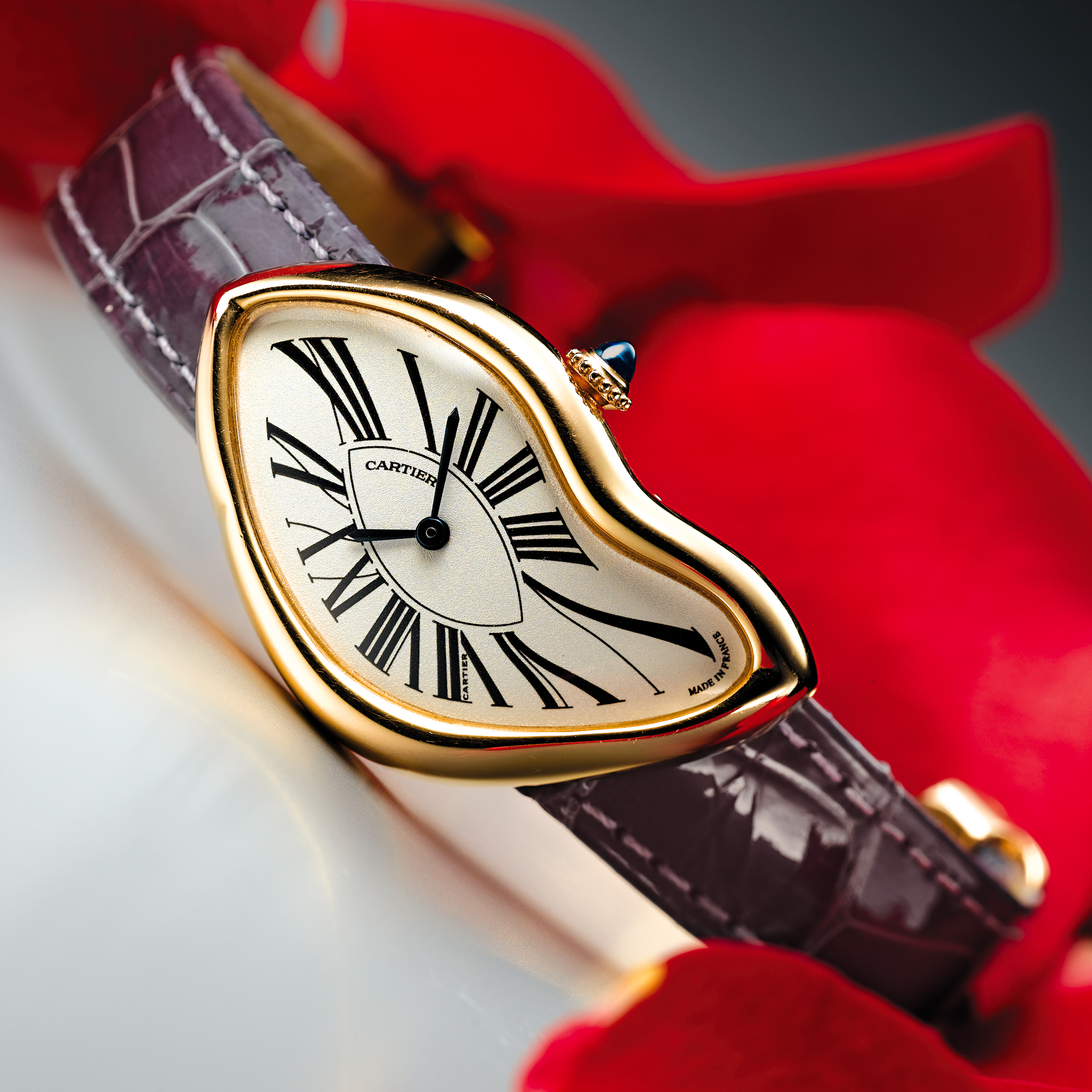 CARTIER, A LADY'S FINE PINK GOLD ASSYMETRIC WRISTWATCHCIRCA 1995 CRASH 