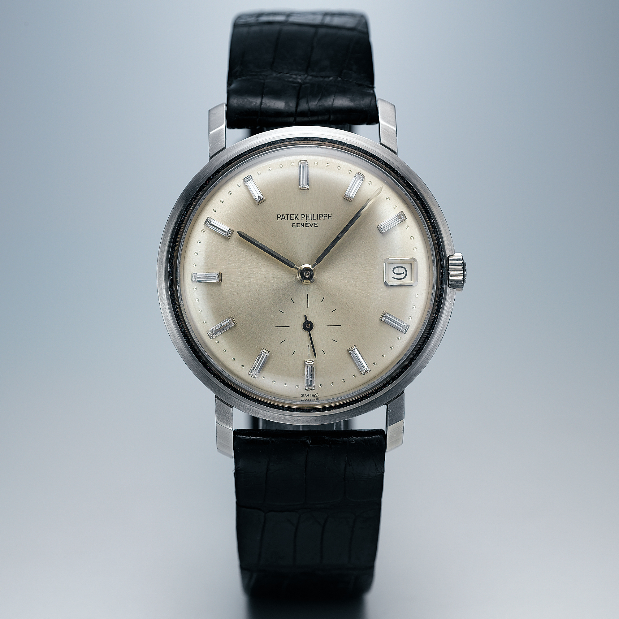 PATEK PHILIPPE, A FINE AND VERY RARE PLATINUM AND BAGUETTE DIAMOND SET AUTOMATIC WRISTWATCH WITH DATECIRCA 1964 REF 3445 MONODATE MVT 1123577 CASE 319736