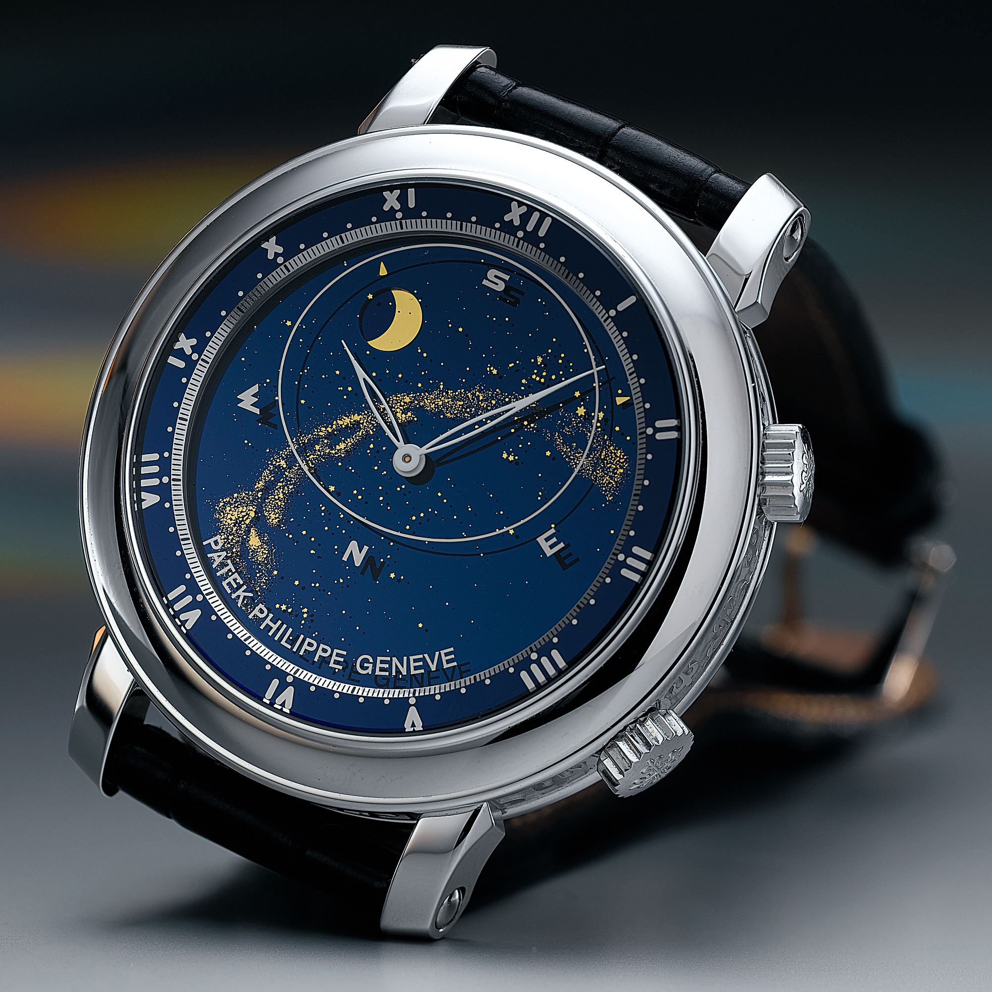 Patek Philippe, A  VERY RARE WHITE GOLD AUTOMATIC ASTRONOMICAL WRISTWATCH WITH SKY CHART, PHASES AND POSITION OF THE MOON AND TIME OF MERIDIAN PASSAGE OF SIRIUS AND THE MOONCIRCA 2005 REF 5102 CELESTIAL MVT 3328295 CASE 4310578