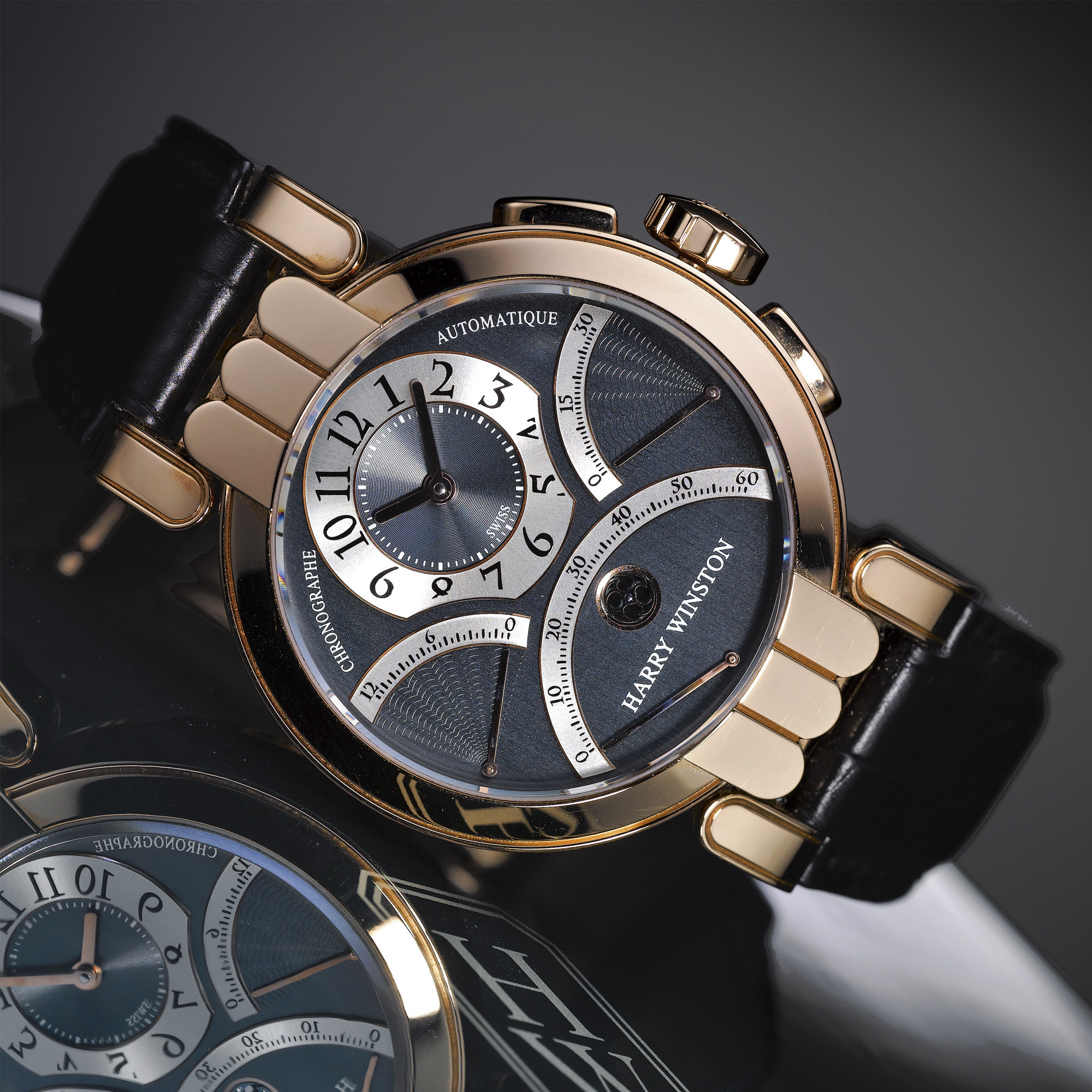 Harry Winston, A PINK GOLD AUTOMATIC TRIPLE RETROGRADE CHRONOGRAPH WRISTWATCH WITH REGISTERS CIRCA 1995 N0 11