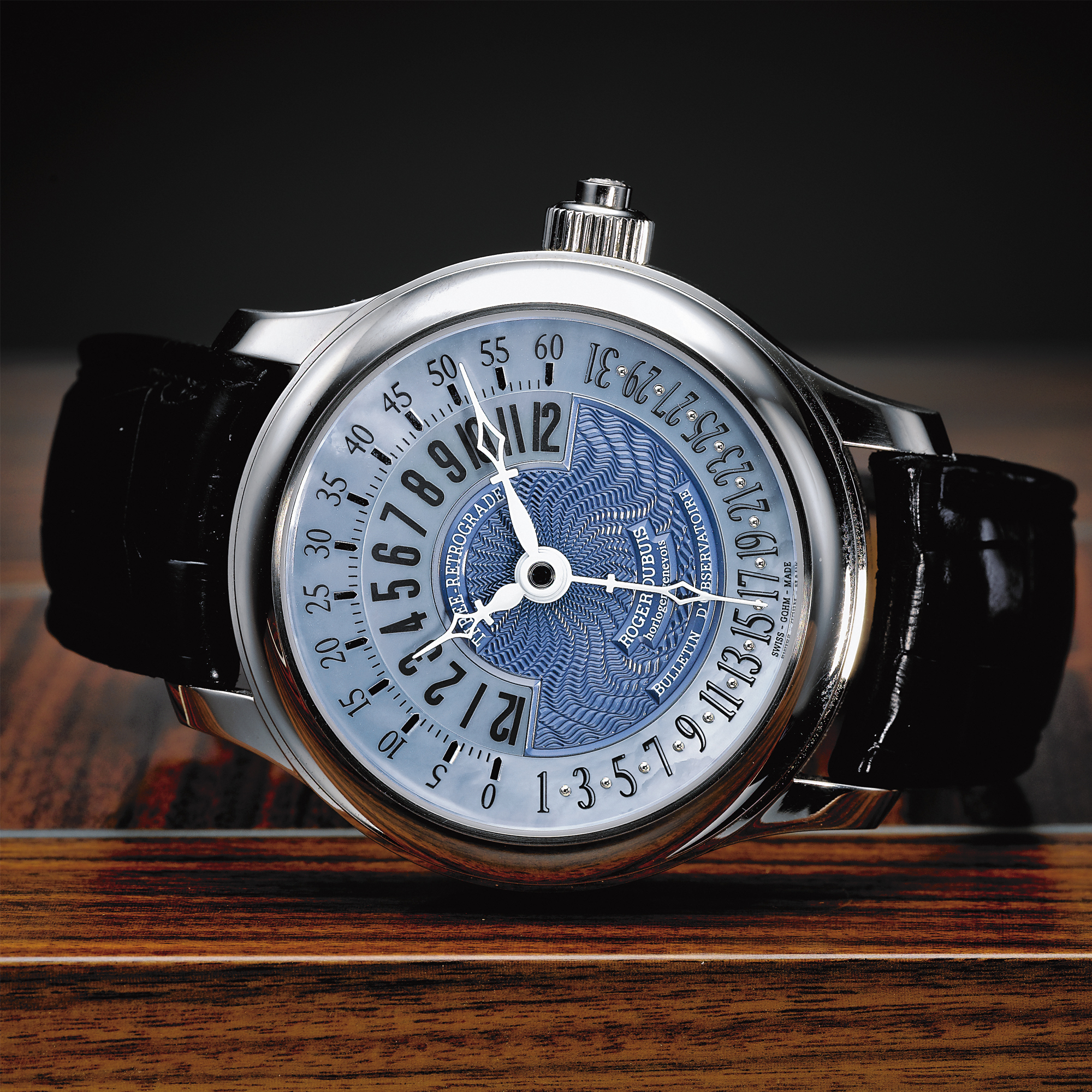 Roger Dubuis, A FINE LIMITED EDITION WHITE GOLD AUTOMATIC WRISTWATCH WITH TRIPLE RETROGRADE HOUR, MINUTE, DATE AND MOTHER-OF-PEARL DIAL CIRCA 2007 SYMPATHIE NO 07/28
 