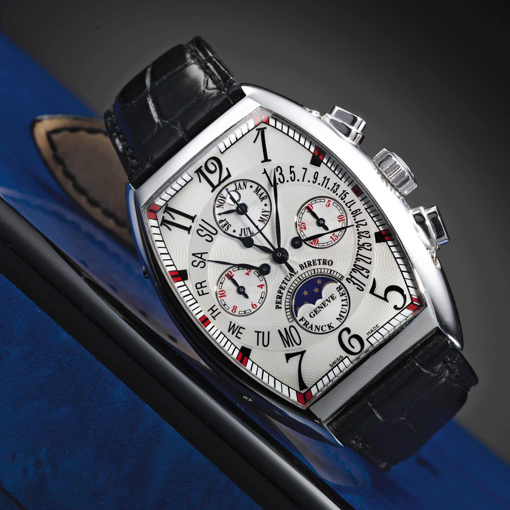 Franck Muller, A FINE OVERSIZED WHITE GOLD TONNEAU FORM AUTOMATIC BI-RETROGRADE PERPETUAL CAENDAR CHRONOGRAPH WRISTWATCH WITH REGISTERS, MOON-PHASES AND LEAP YEAR INDICATION CIRCA 2005 CINTRÉE CURVEX CHRONO IRETROGRADE REF 7850 CC QPB NO 36