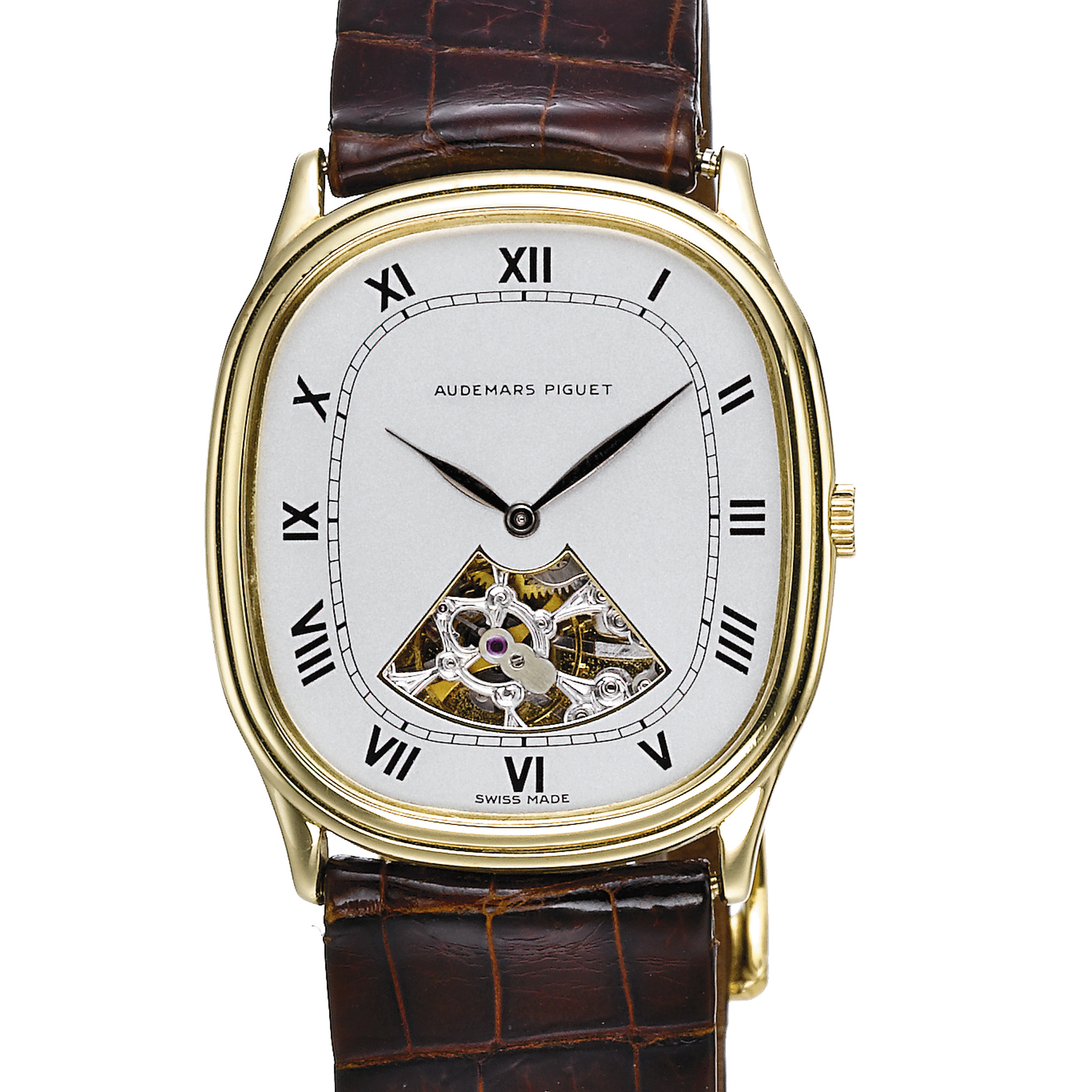 AUDEMARS PIGUET, A SLIM GOLD OVAL FORM WRISTWATCH CIRCA 1980