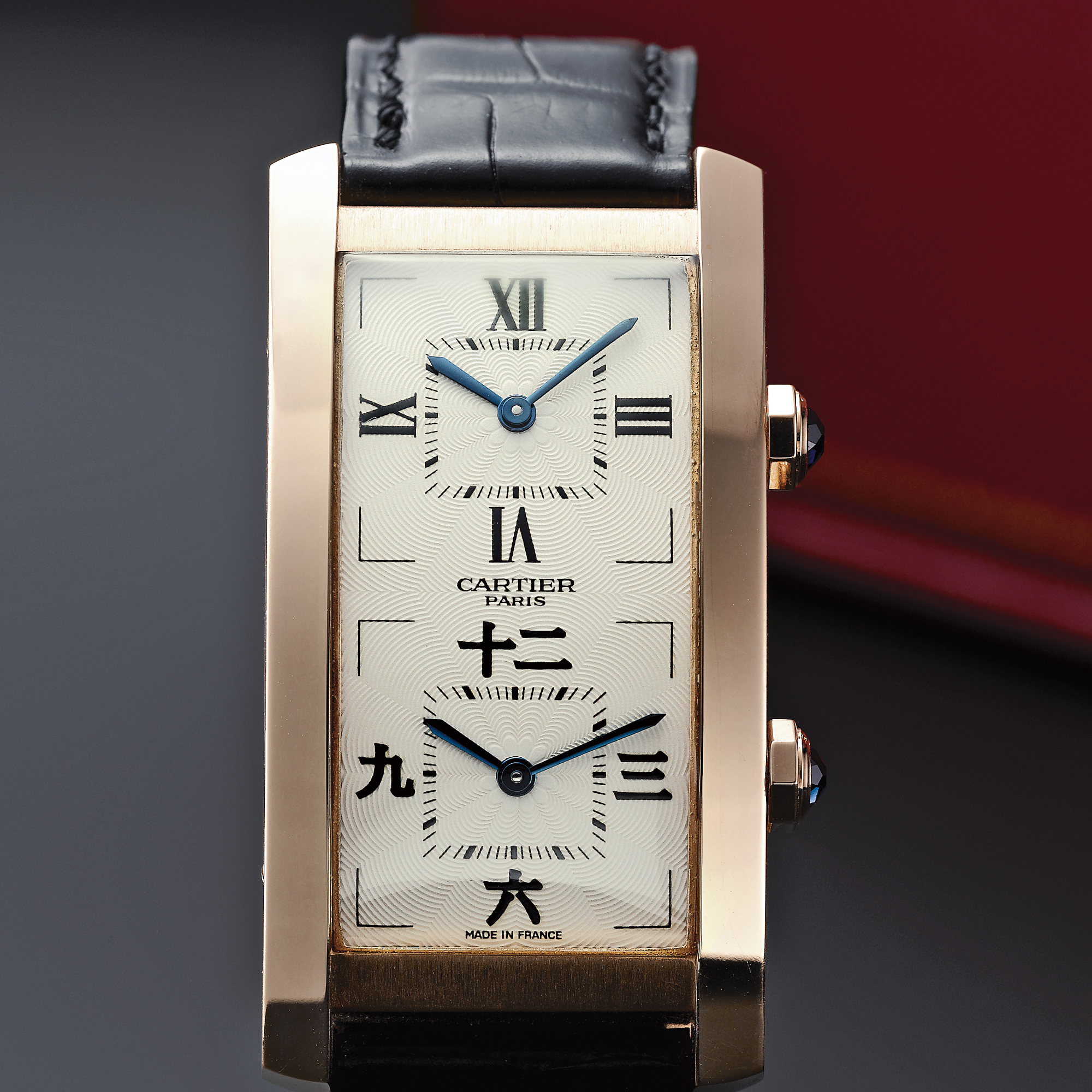 Cartier, A FINE LIMITED EDITION PINK GOLD CURVED RECTANGULAR DUAL TIME ZONE WRISTWATCH CIRCA 1995 TANK CINTRÉE COLLECTION PRIVÉE NO 027/100