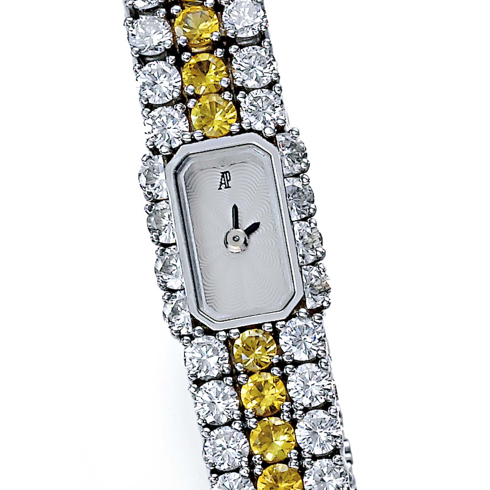 Audemars Piguet, A LADY'S PLATINUM, DIAMOND AND YELLOW SAPPHIRE SET RECTANGULAR BRACELET WATCH CIRCA 2000