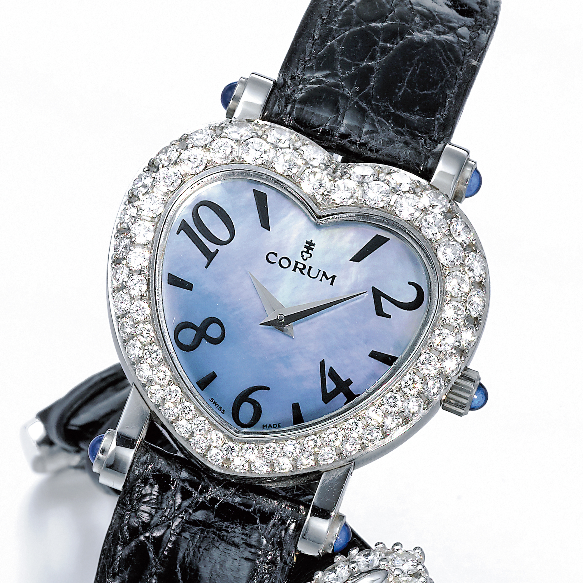 Corum, A LADY'S HEART-SHAPED STAINLESS STEEL AND DIAMOND SET WRISTWATCH WITH MOTHER-OF-PEARL DIAL CIRCA 2000