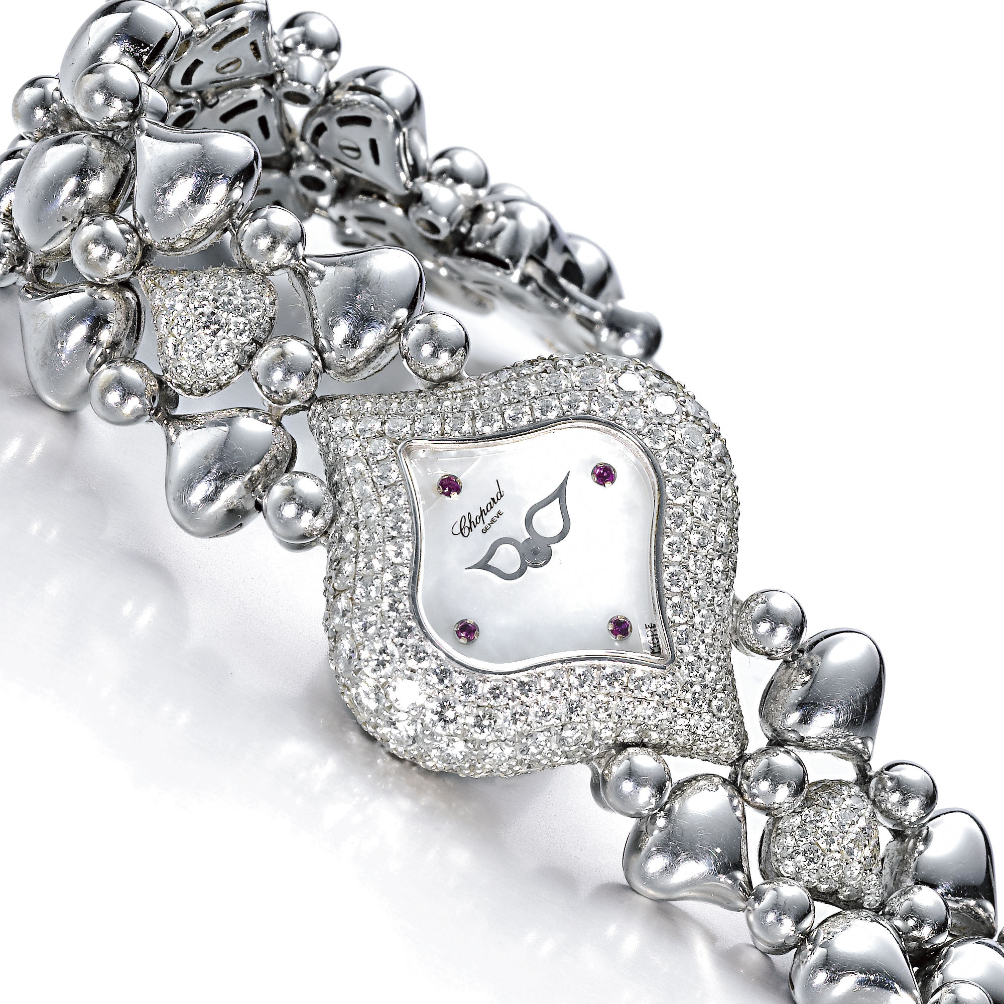 Chopard, A LADY'S WHITE GOLD AND DIAMOND SET BRACELET WATCH WITH MOTHER-OF-PEARL DIAL CIRCA 2005