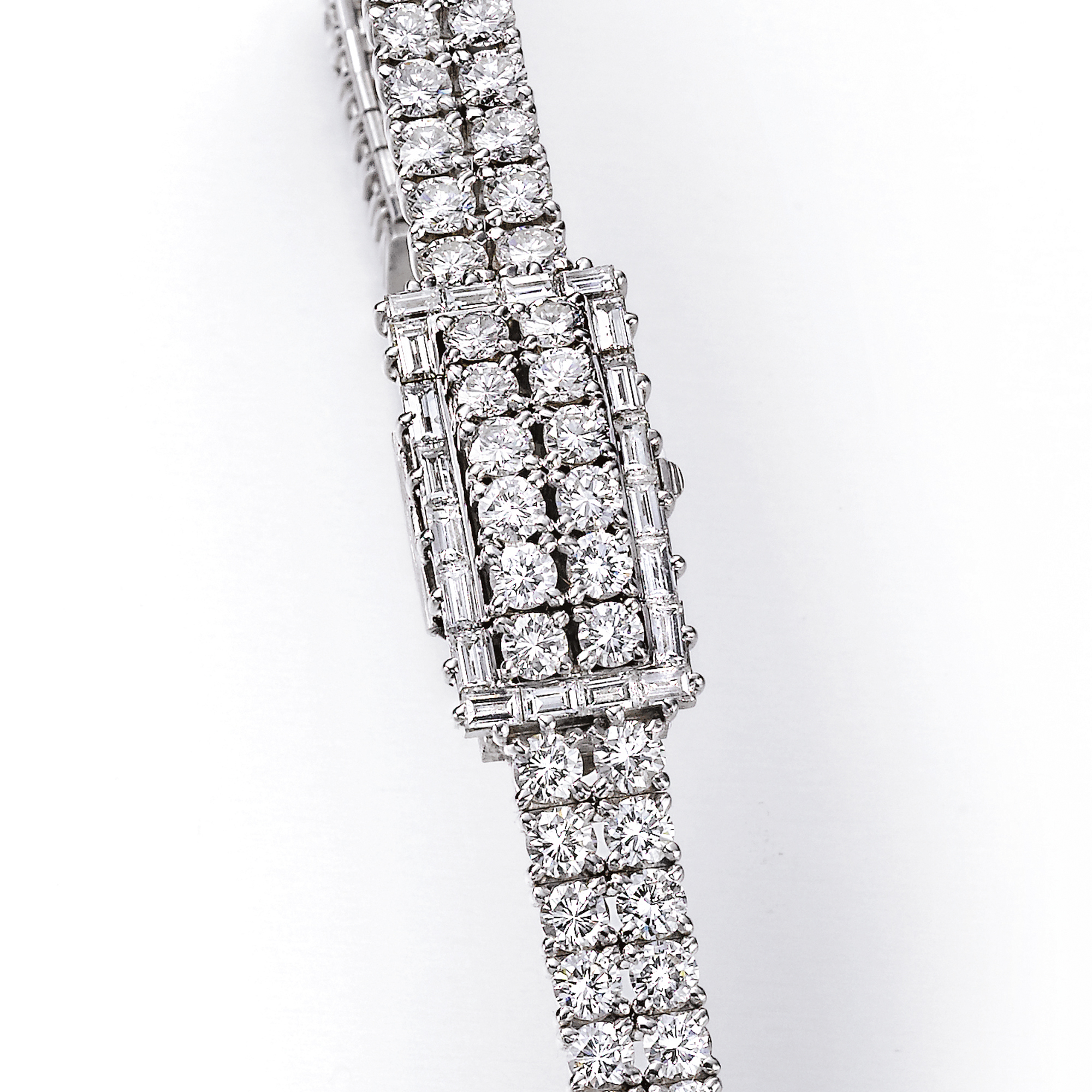 Omega, A LADY'S FINE PLATINUM AND DIAMOND SET BRACELET WATCH WITH A CONCEALED DIAL CIRCA 1968