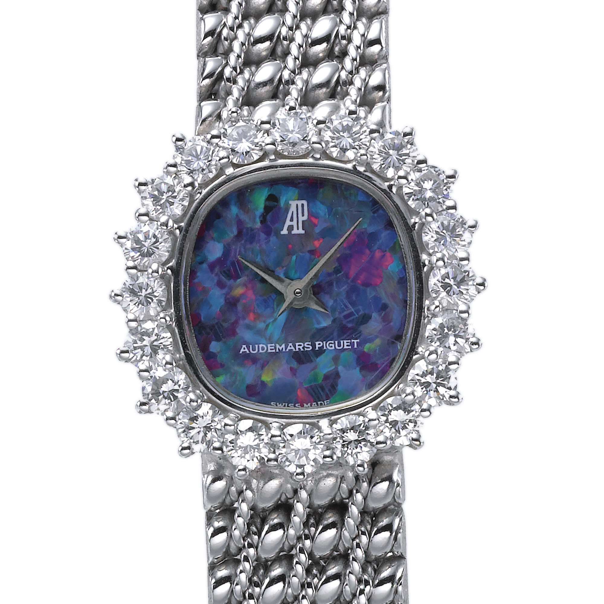 AUDEMARS PIGUET, A LADY'S FINE WHITE GOLD AND DIAMOND SET OVAL SHAPED BRACELET WATCH WITH OPAL DIAL CIRCA 1995