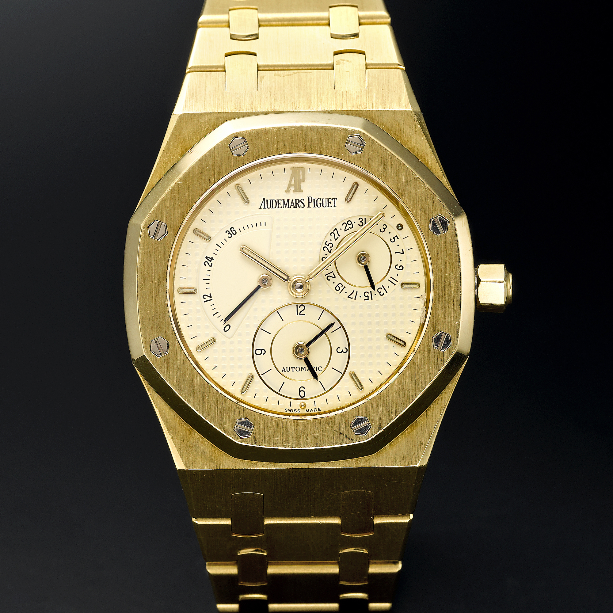 Audemars Piguet, A STAINLESS  STEEL AUTOMATIC DUAL TIME ZONE WRISTWATCH WITH DATE, POWER RESERVE INDICATION AND BRACELETCIRCA 1995 ROYAL OAK N0 343
