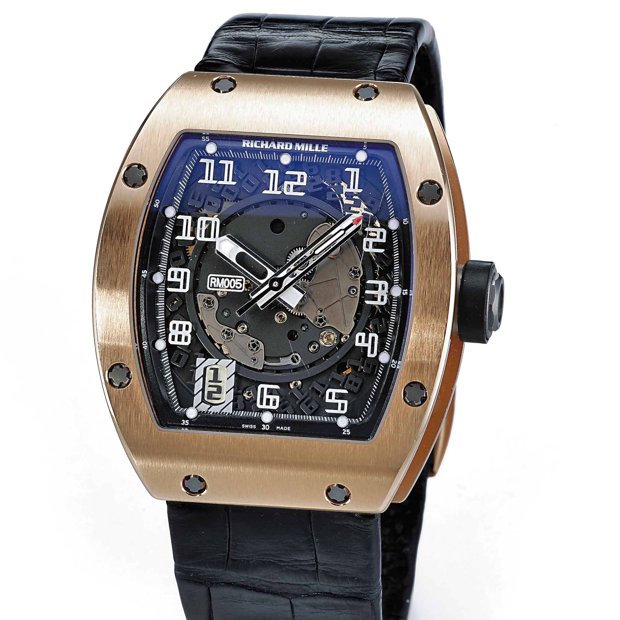Richard Mille, A FINE AND UNUSUAL PINK GOLD TONNEAU FORM AUTOMATIC CENTER SECONDS WRISTWATCH WITH DATE AND SKELETONISED DIALCIRCA 2005 RM005