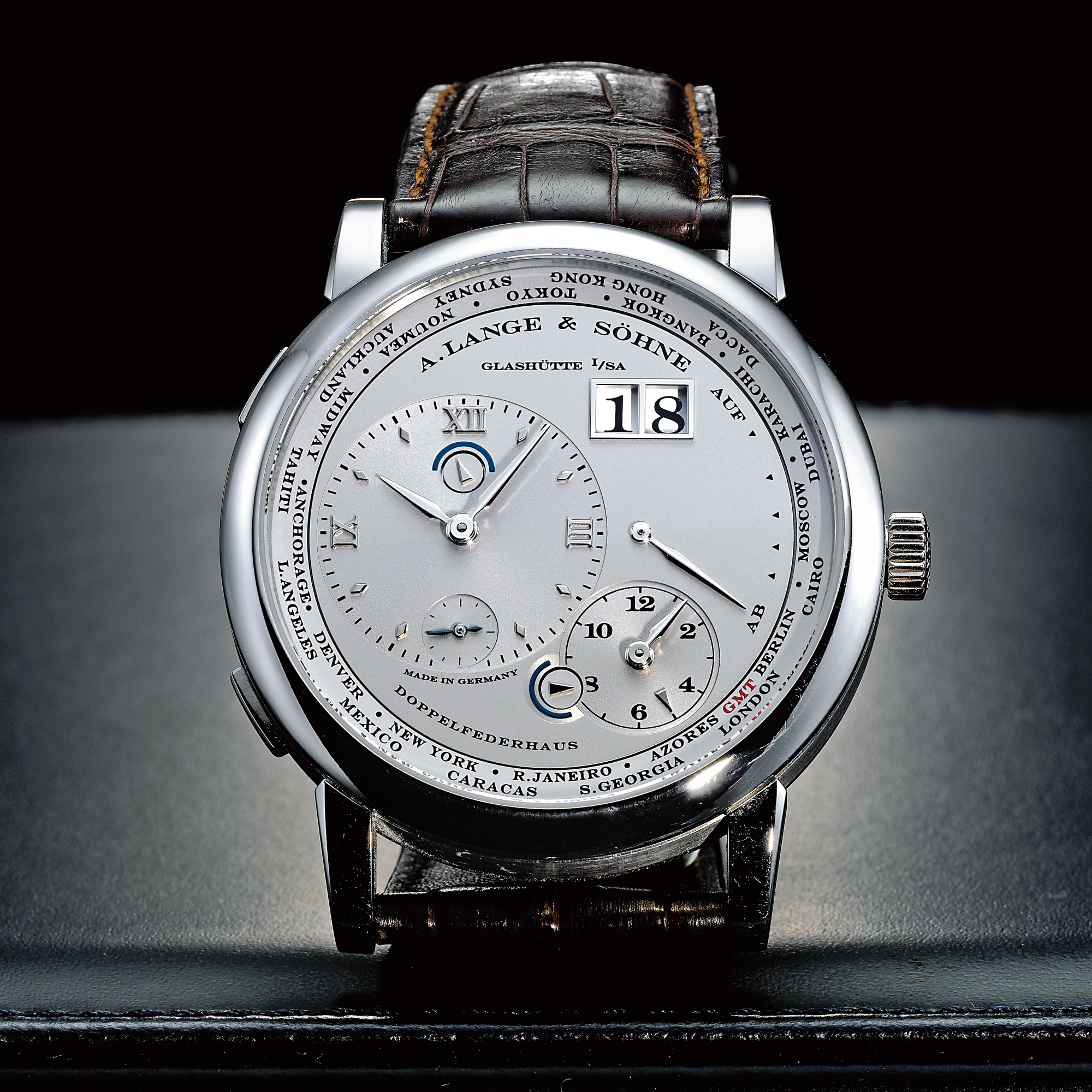 A. Lange & Söhne, A FINE AND RARE PLATINUM DUAL TIME ZONE AND WORLD TIME WRISTWATCH WITH OVERSIZED DATE, POWER RESERVE AND DAY AND NIGHT INDICATIONCIRCA 2006 LANGE 1 TIME ZONE