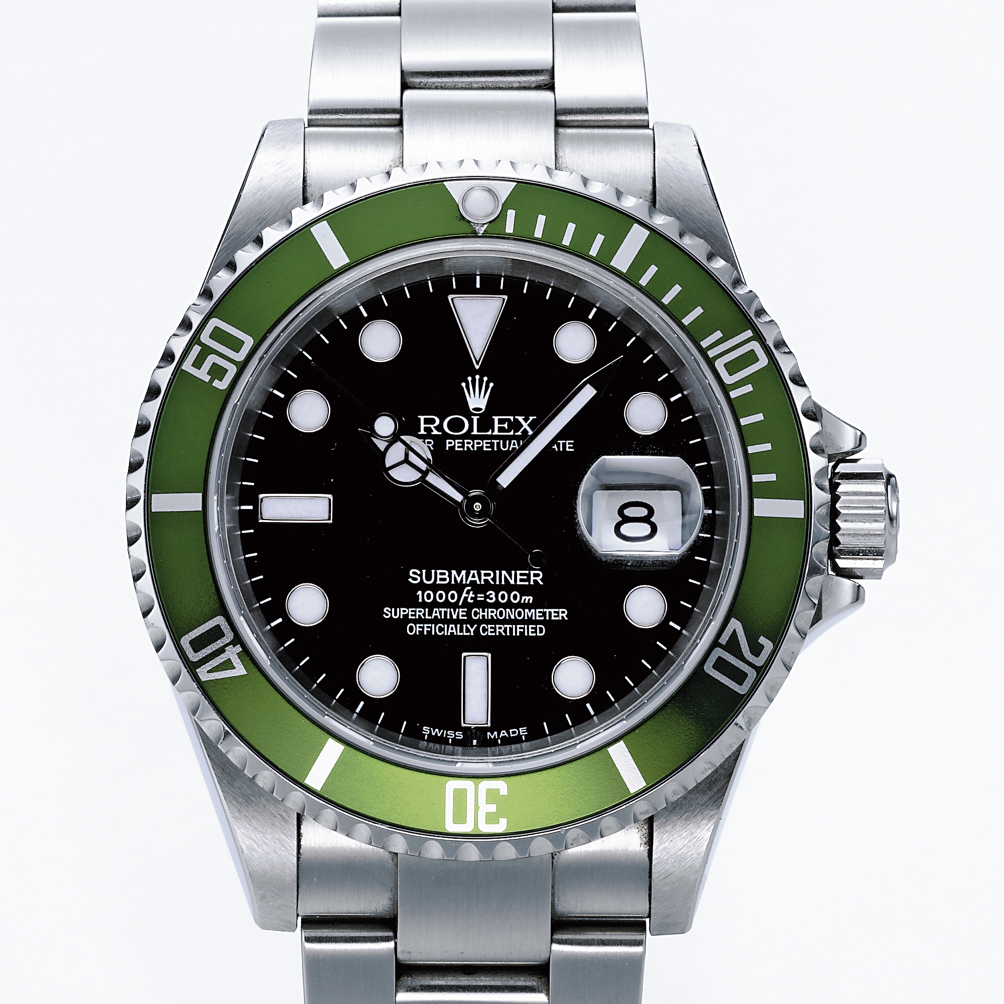 Rolex, A STAINLESS STEEL AUTOMATIC CENTER SECONDS WRISTWATCH WITH DATE, BRACELET AND GREEN BEZEL CIRCA 2003 REF 16610 OYSTER PERPETUAL DATE SUBMARINER