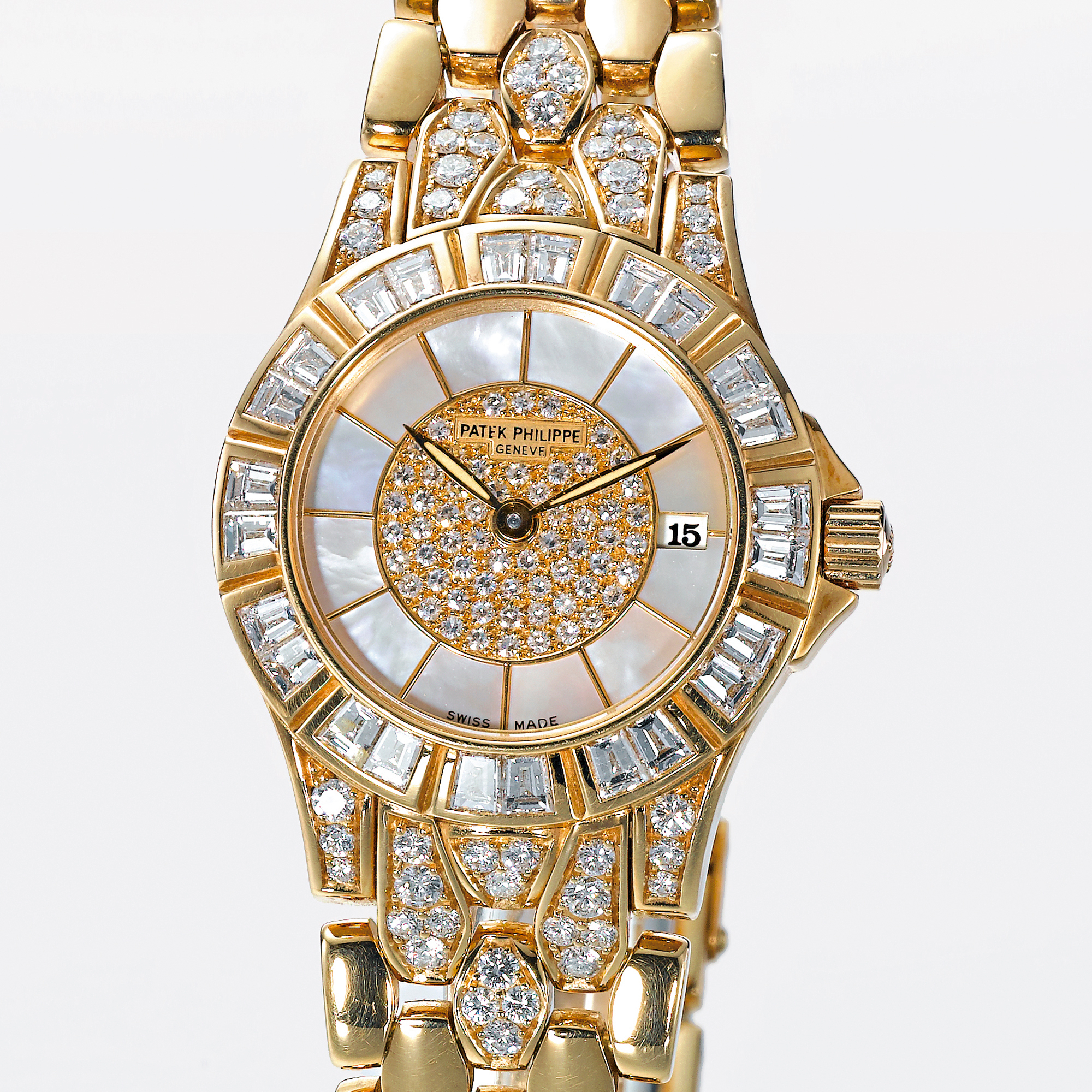 Patek Philippe, A LADY'S FINE GOLD AND DIAMOND SET BRACELET WATCH WITH DATE AND MOTHER-OF-PEARL DIALCIRCA 1990 REF 4883/1J NEPTUNE