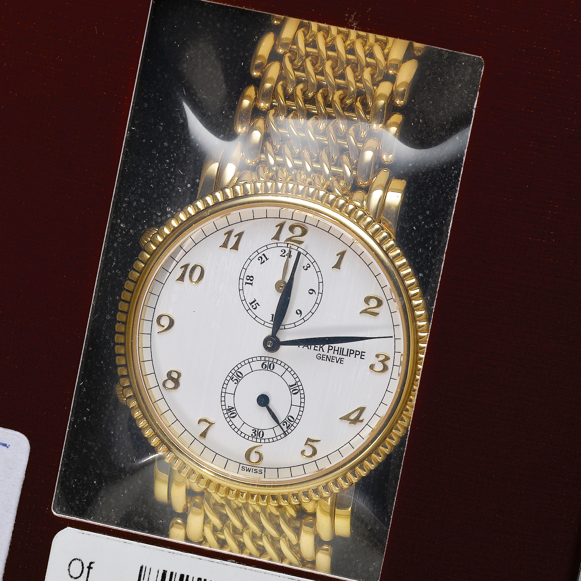 Patek Philippe, A FINE GOLD DUAL TIME ZONE WRISTWATCH WITH 24-HOUR INDICATION CIRCA 1998 REF 5034/1J-001 TRAVEL TIME MVT 3088389 CASE 4051712