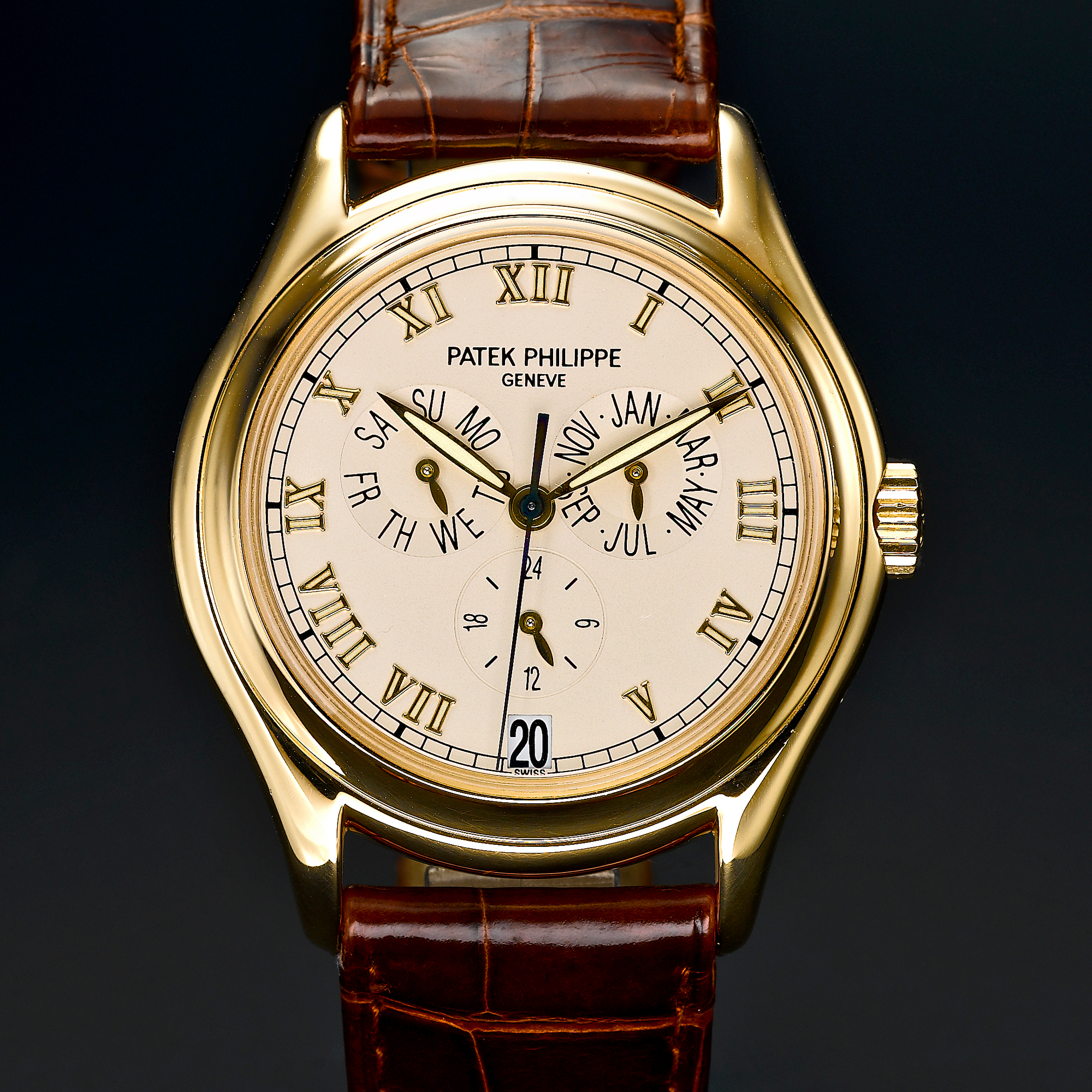 Patek Philippe, A FINE GOLD AUTOMATIC CENTRE SECONDS ANNUAL CALENDAR WRISTWATCH WITH DATE CIRCA 1999 REF 5035J MVT 3059932