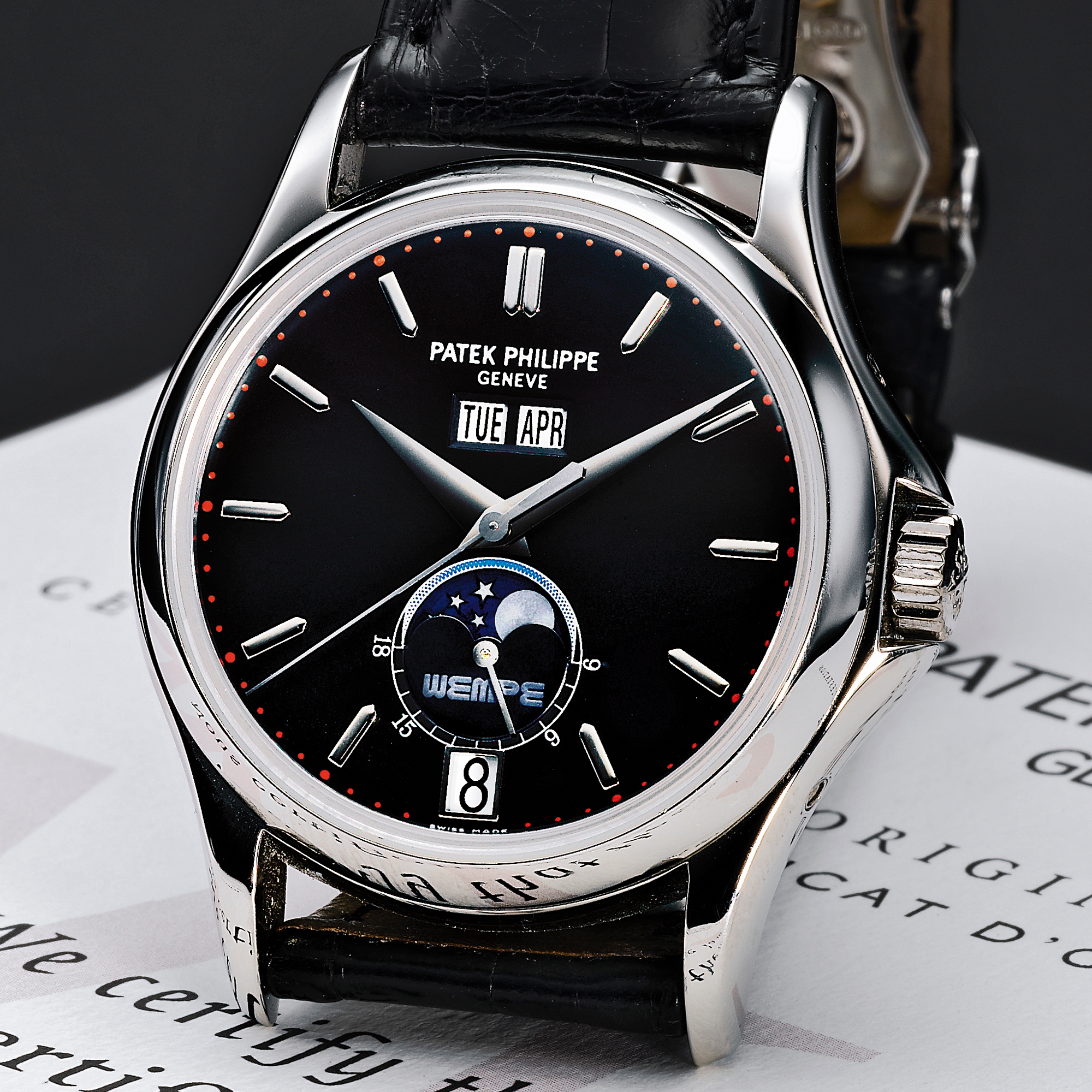 PATEK PHILIPPE, RETAILED BY WEMPE: A FINE AND RARE LIMITED EDITION PLATINUM AUTOMATIC ANNUAL CALENDAR WRISTWATCH WITH MOON-PHASES AND 24 HOUR INDICATION CIRCA 2003 REF 5125P MVT 3360276 CASE 4215659 80/100