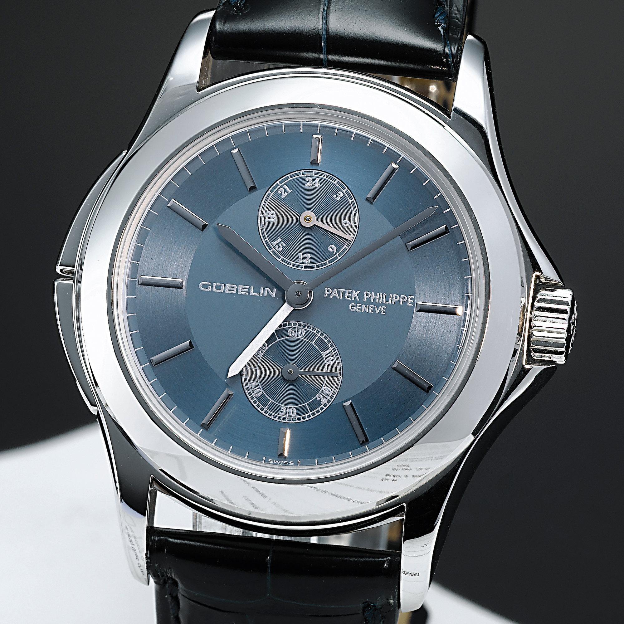 Patek Philippe, A FINE AND RARE LIMITED EDITION WHITE GOLD DUAL TIME ZONE WRISTWATCH WITH TWO-TONE BLUE DIAL CIRCA 2004 REF 5134G CALATRAVA TRAVEL TIME MVT 3087158 CASE 4254967
