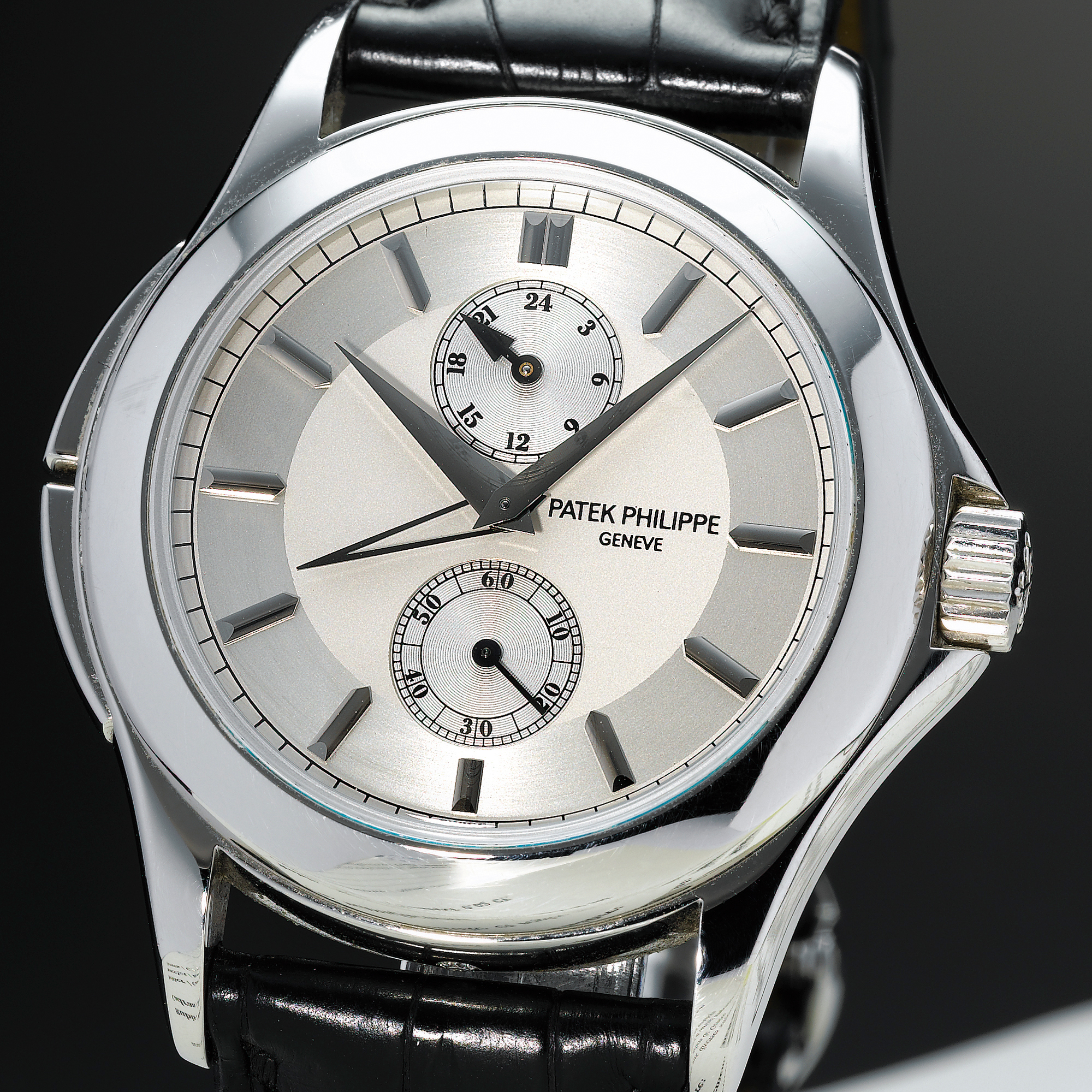 Patek Philippe, A FINE AND RARE PLATINUM DUAL TIME ZONE WRISTWATCHCIRCA 2004 REF 5134P CALATRAVA TRAVEL TIME MVT 3087808 CASE 4264607