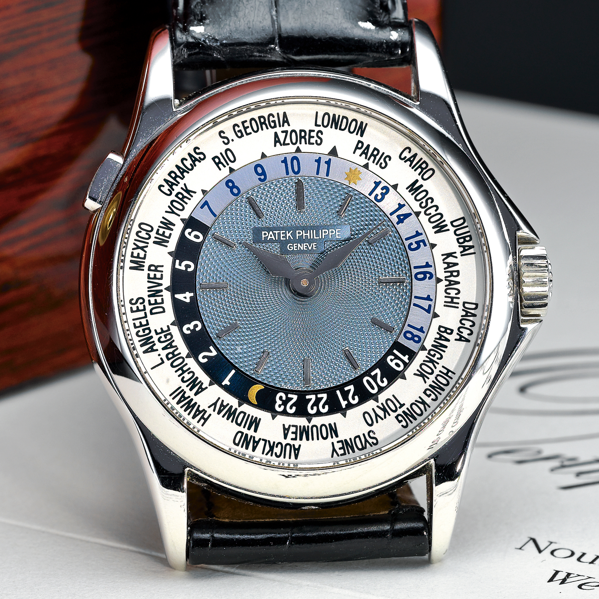 Patek Philippe, A FINE AND RARE PLATINUM AUTOMATIC WORLD TIME WRISTWATCH CIRCA 2002 REF 5110P MVT 3209141 CASE 4210243 