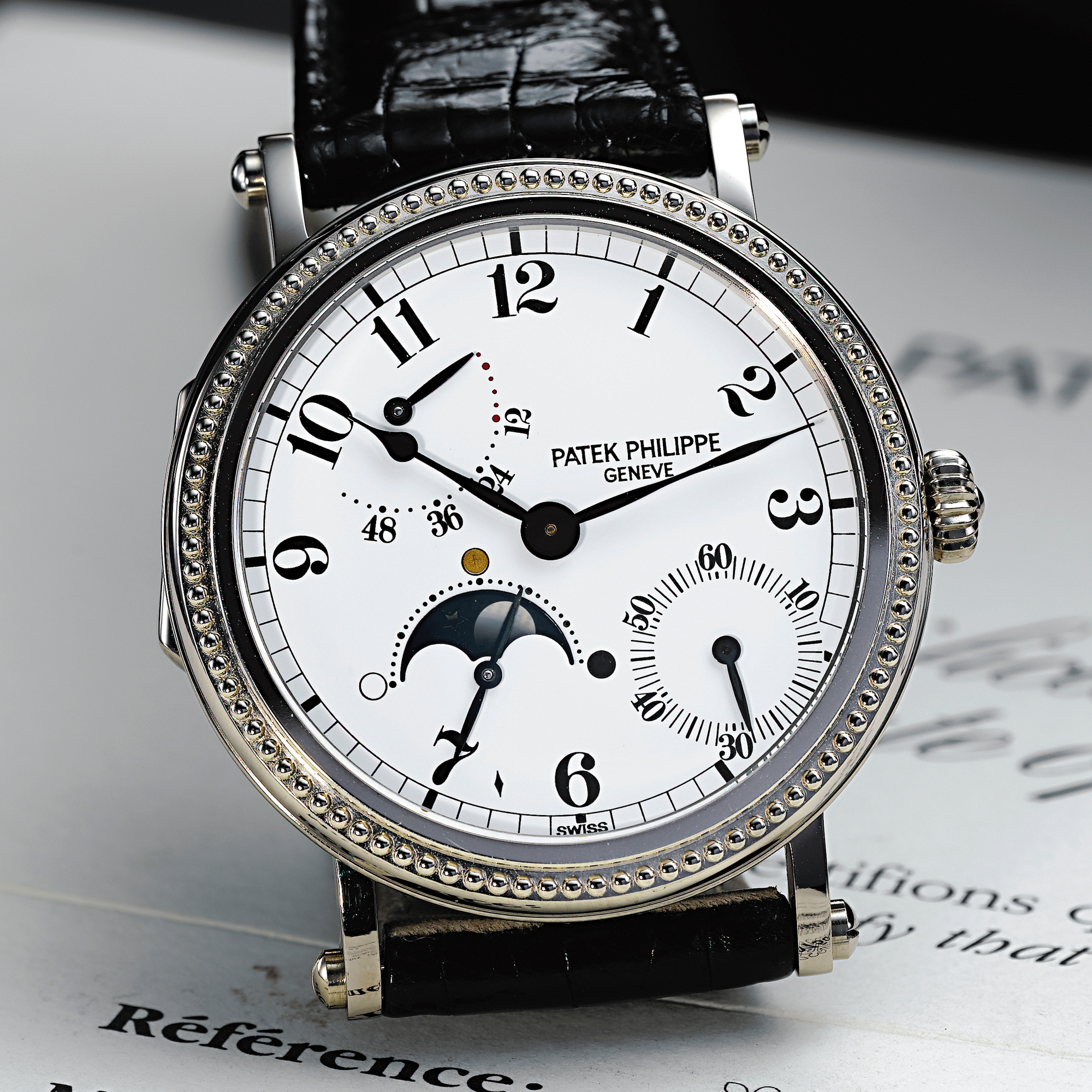 Patek Philippe, A FINE WHITE GOLD AUTOMATIC WRISTWATCH WITH POWER RESERVE AND MOON-PHASES circa 1995 REF 5015 MVT 3052254 CASE 4022000A fine pink gold automatic wristwatch with power reserve and moon-phases circa 1995, no.1.959.821, ref.5015