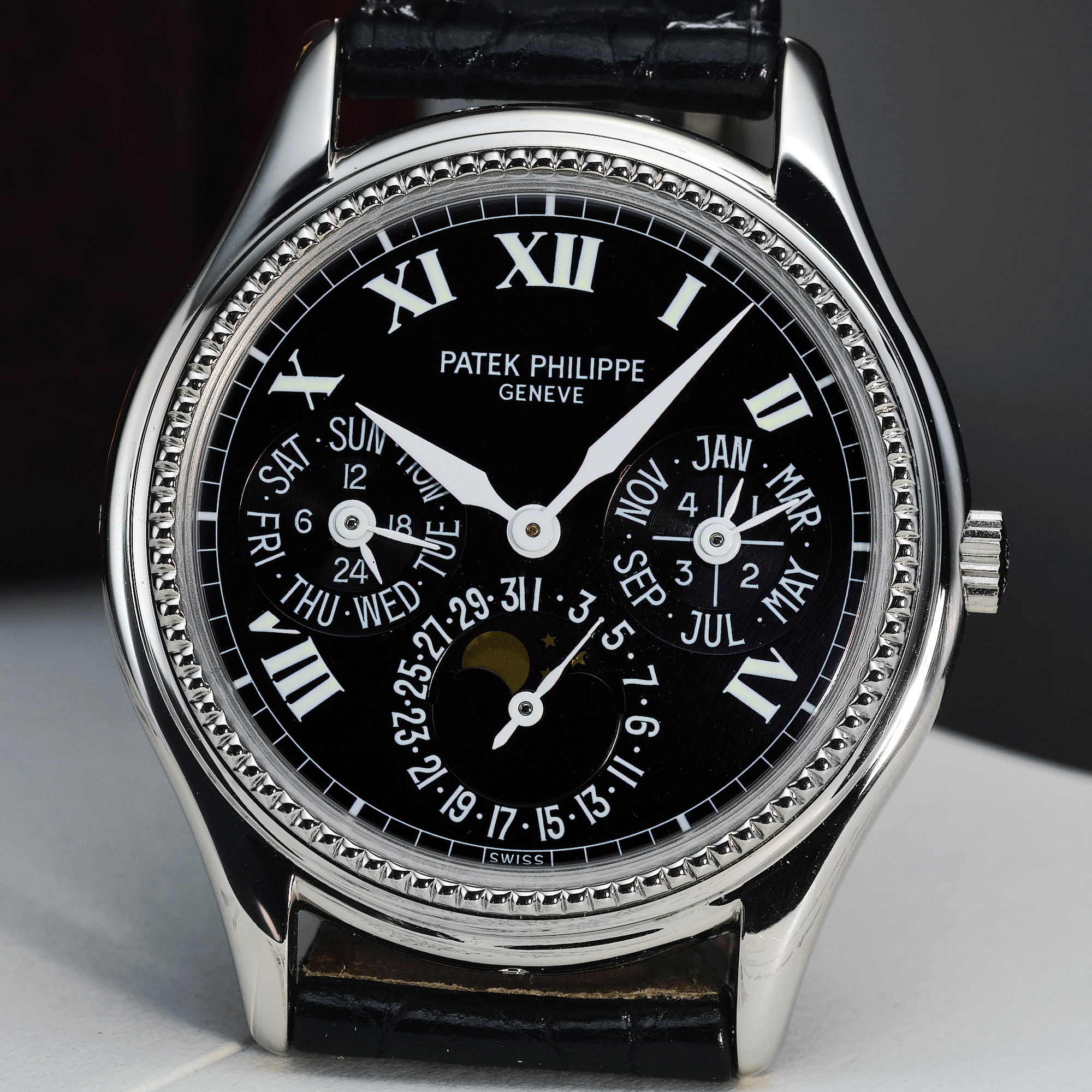 Patek Philippe, A FINE AND RARE LIMITED EDITION WHITE GOLD AUTOMATIC PERPETUAL CALENDAR WRISTWATCH WITH MOON-PHASES CIRCA 1997 REF 5038G MVT 775997