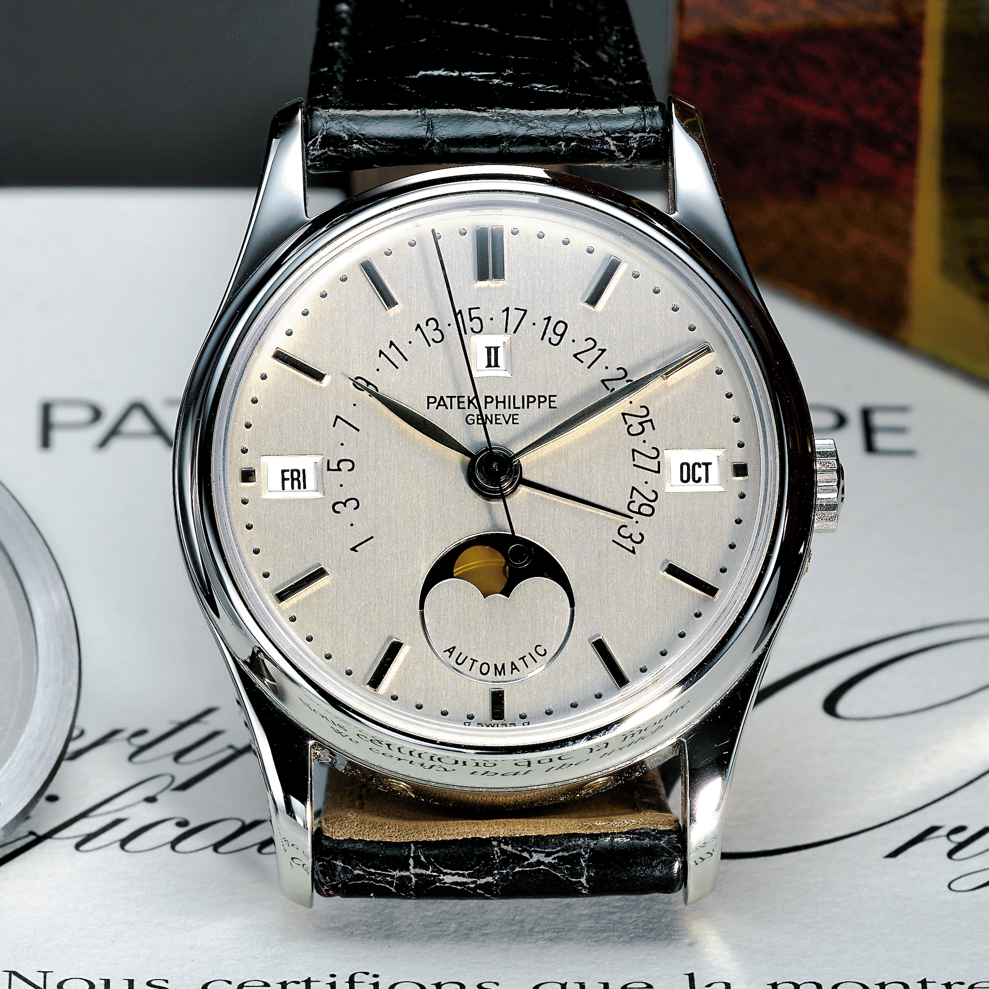 Patek Philippe, A FINE AND RARE PLATINUM AUTOMATIC CENTER SECONDS RETROGRADE PERPETUAL CALENDAR WRISTWATCH WITH MOON-PHASES AND LEAP-YEAR INDICATION CIRCA 1994 REF 5050P MVT 1957717 CASE 2998701