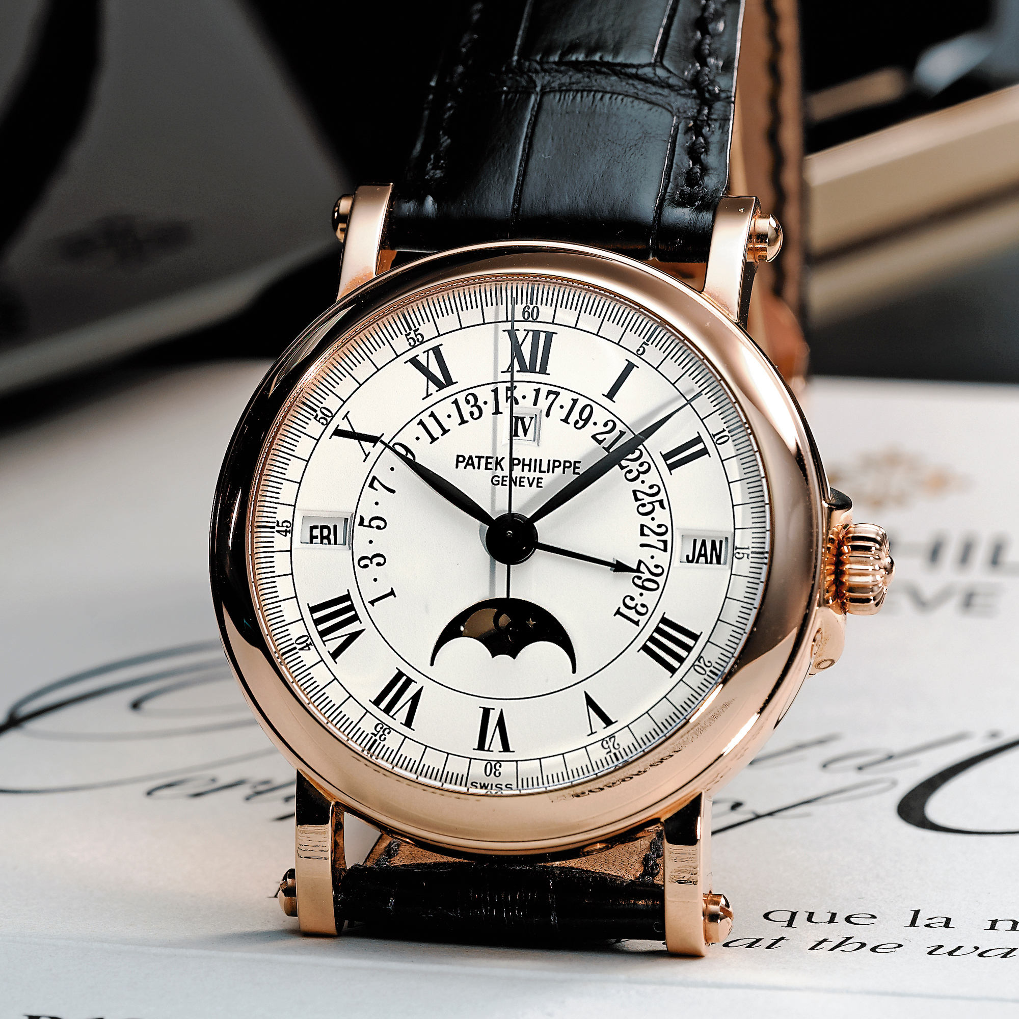 Patek Philippe, A FINE PINK GOLD AUTOMATIC CENTER SECONDS RETROGRADE PERPETUAL CALENDAR WRISTWATCH WITH MOON-PHASES CIRCA 2006 REF 5059R MVT 1958663 CASE 4117049