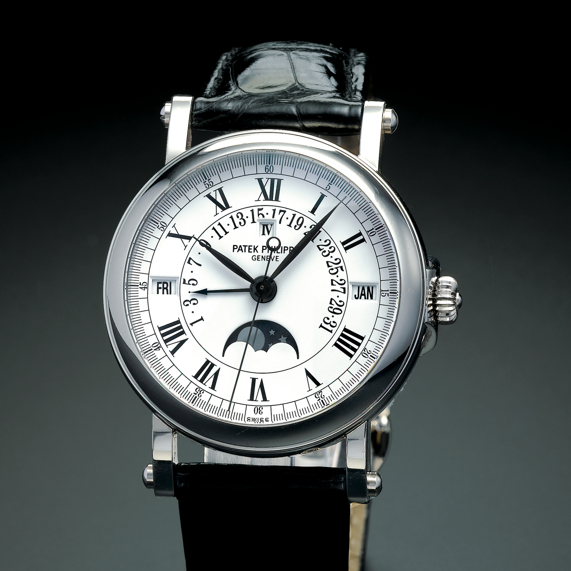 Patek Philippe, A FINE WHITE GOLD AUTOMATIC CENTER SECONDS RETROGRADE PERPETUAL CALENDAR WRISTWATCH WITH MOON-PHASES AND LEAP YEAR INDICATION CIRCA 2003 REF 5059G MVT 3235616 CASE 4128183 