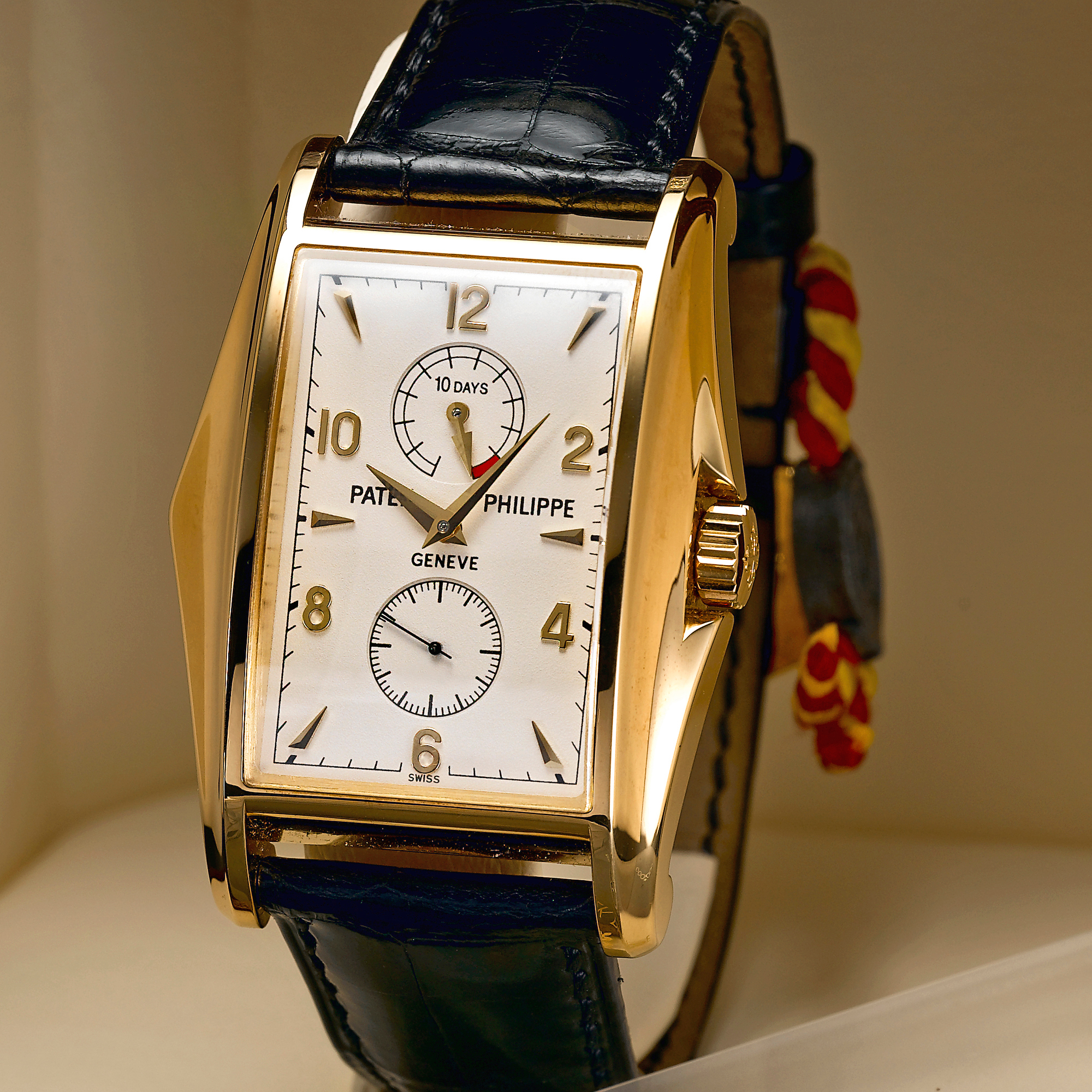 Patek Philippe, A FINE AND RARE LIMITED EDITION GOLD RECTANGULAR WRISTWATCH WITH 10-DAY POWER RESERVE INDICATION CIRCA 2001 REF 5100J MVT 3201648
