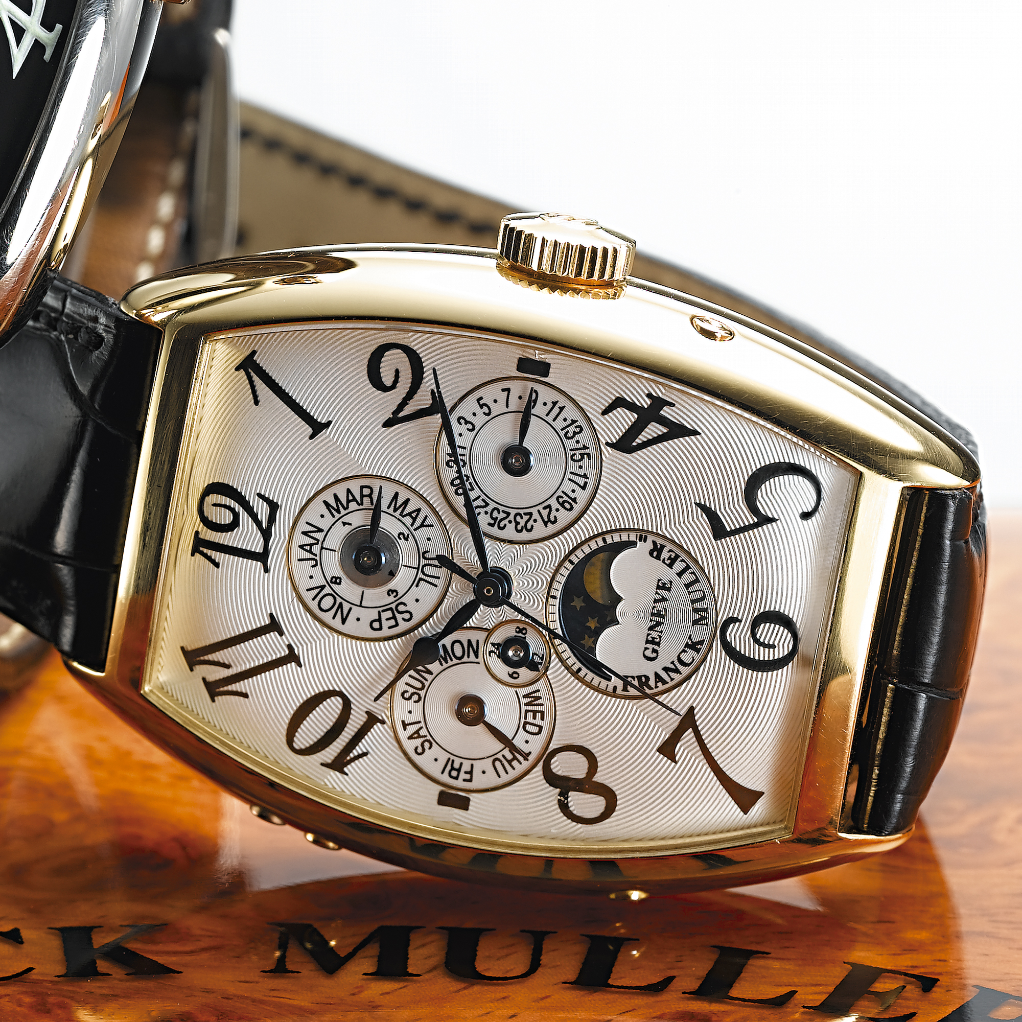 FRANCK MULLER, A GOLD AUTOMATIC CENTRE SECONDS TONNEAU FORM PERPETUAL CALENDAR WRISTWATCH WITH MOON PHASESCIRCA 1998, 5850 QP, NO. 112 