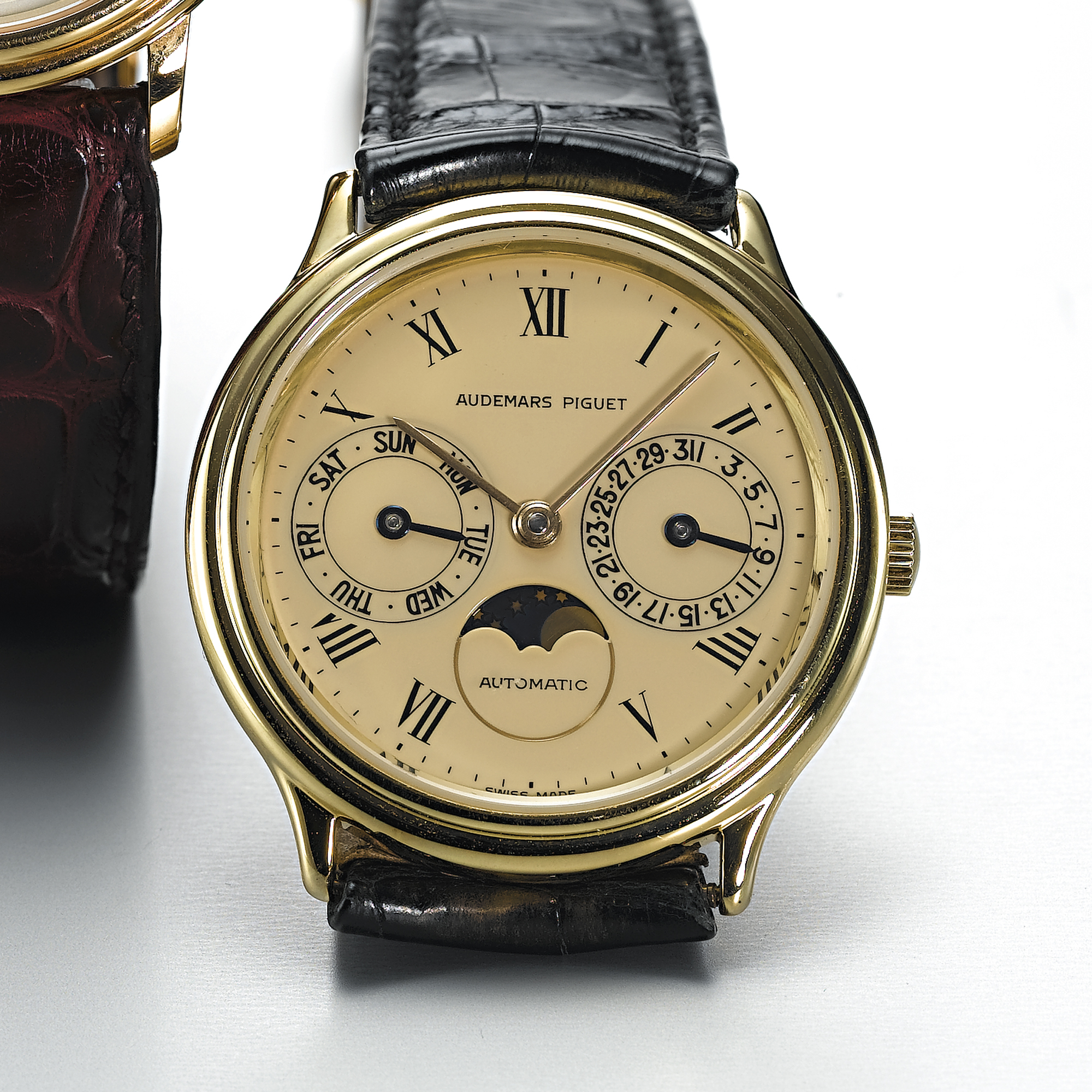 AUDEMARS PIGUET, A GOLD AUTOMATIC WRISTWATCH WITH DAY, DATE AND MOON PHASESCIRCA 1996